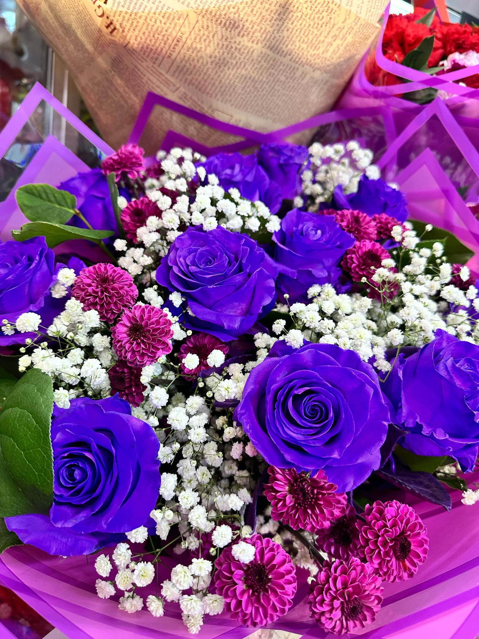 Jumbo (10Rose) Purple Lovers Bouquet (MIX ROSES AND FLOWERS) - One of our top sellers. A jumbo bouquet made with beautiful blossomed purple roses. Great for any birthday or purple lover