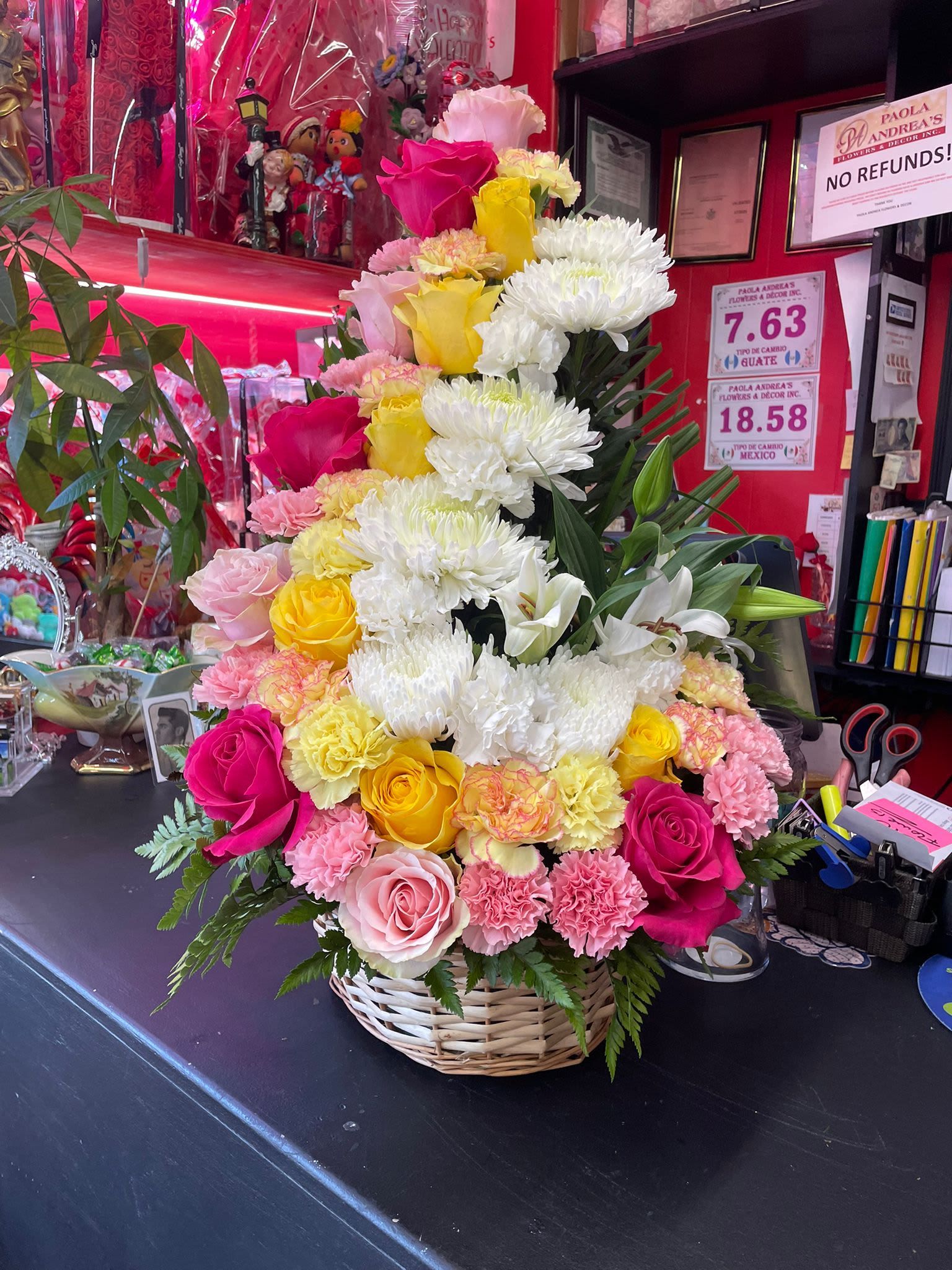 Tall/Vertical Basket Arrangement - A tall vertical basket arrangement perfect for any heartwarming gift or mix funeral arrangment .