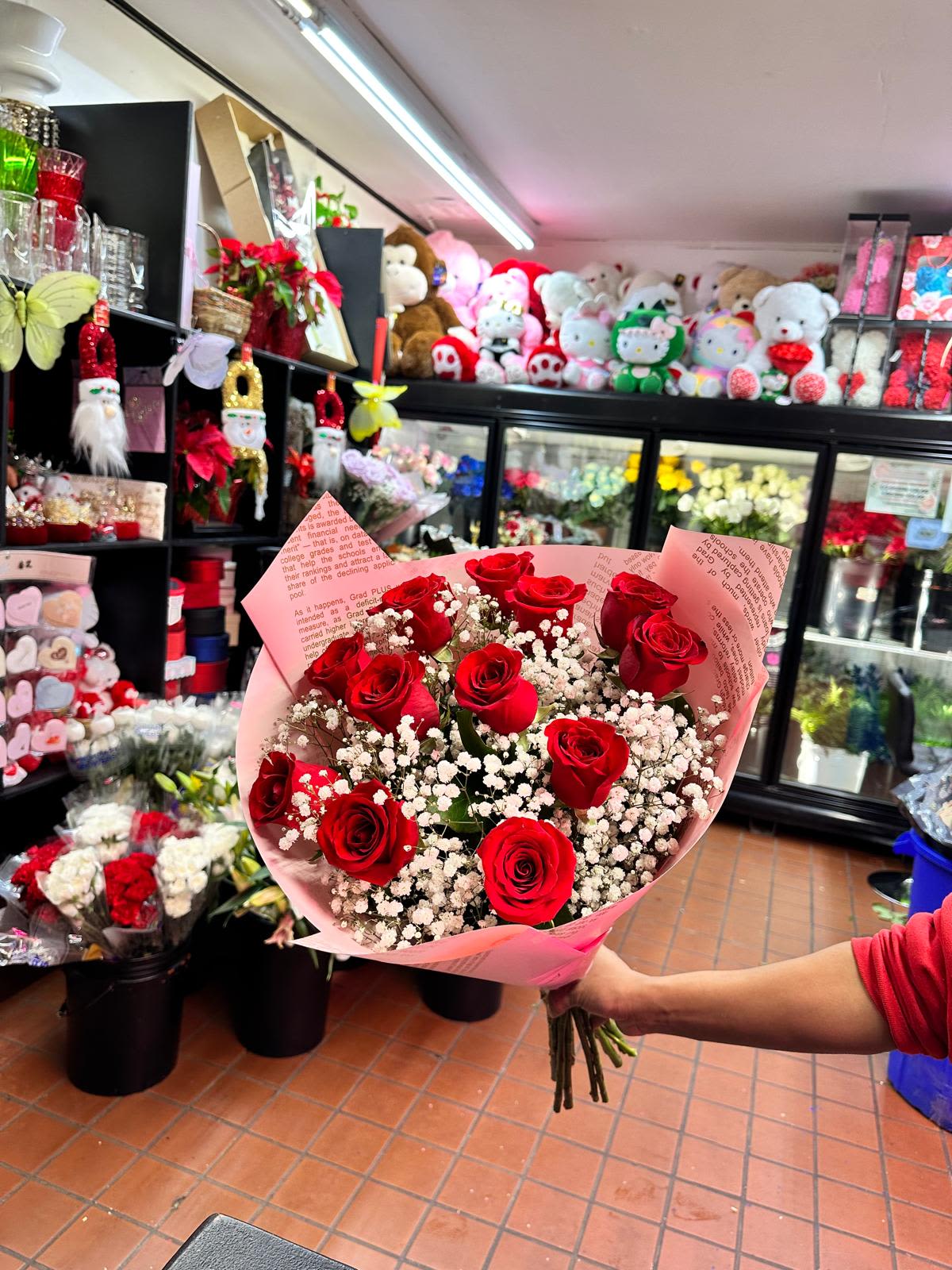 THE CLASSIC DOZ RED ROSES WITH BABY BREATH BOUQUET  - (PAPER &amp; STYLES MAY VARY)