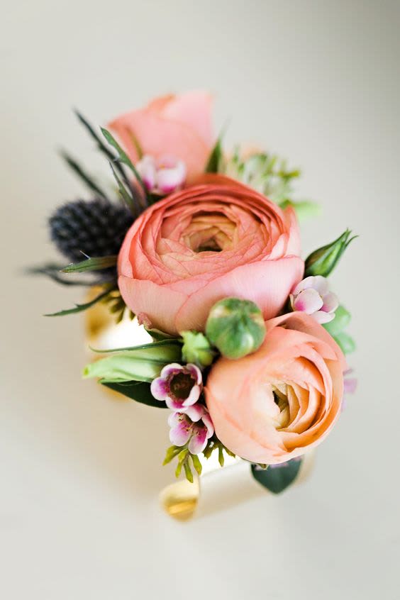 Corsage - Price includes your choice of pink or white spray roses, small greens, filler flower and wristlet/bracelet and ribbon color of your choice.  