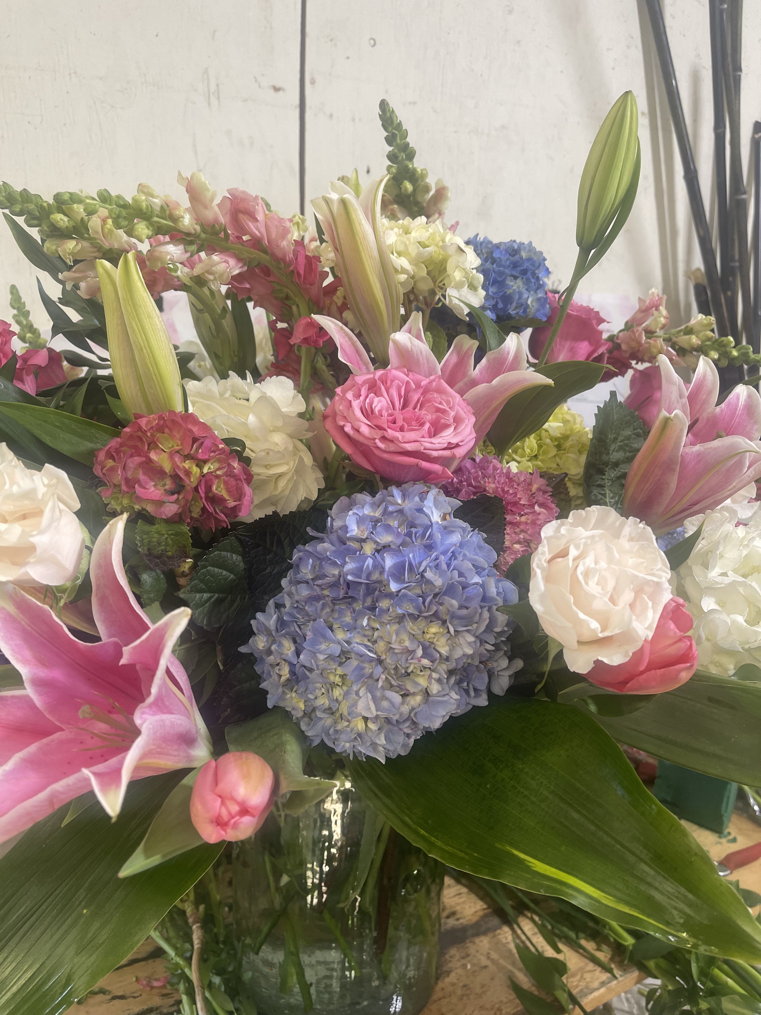 Girlie Girl Flowers - A beautiful creation of hydrangea, tulips, lilies, roses &amp; snapdragons