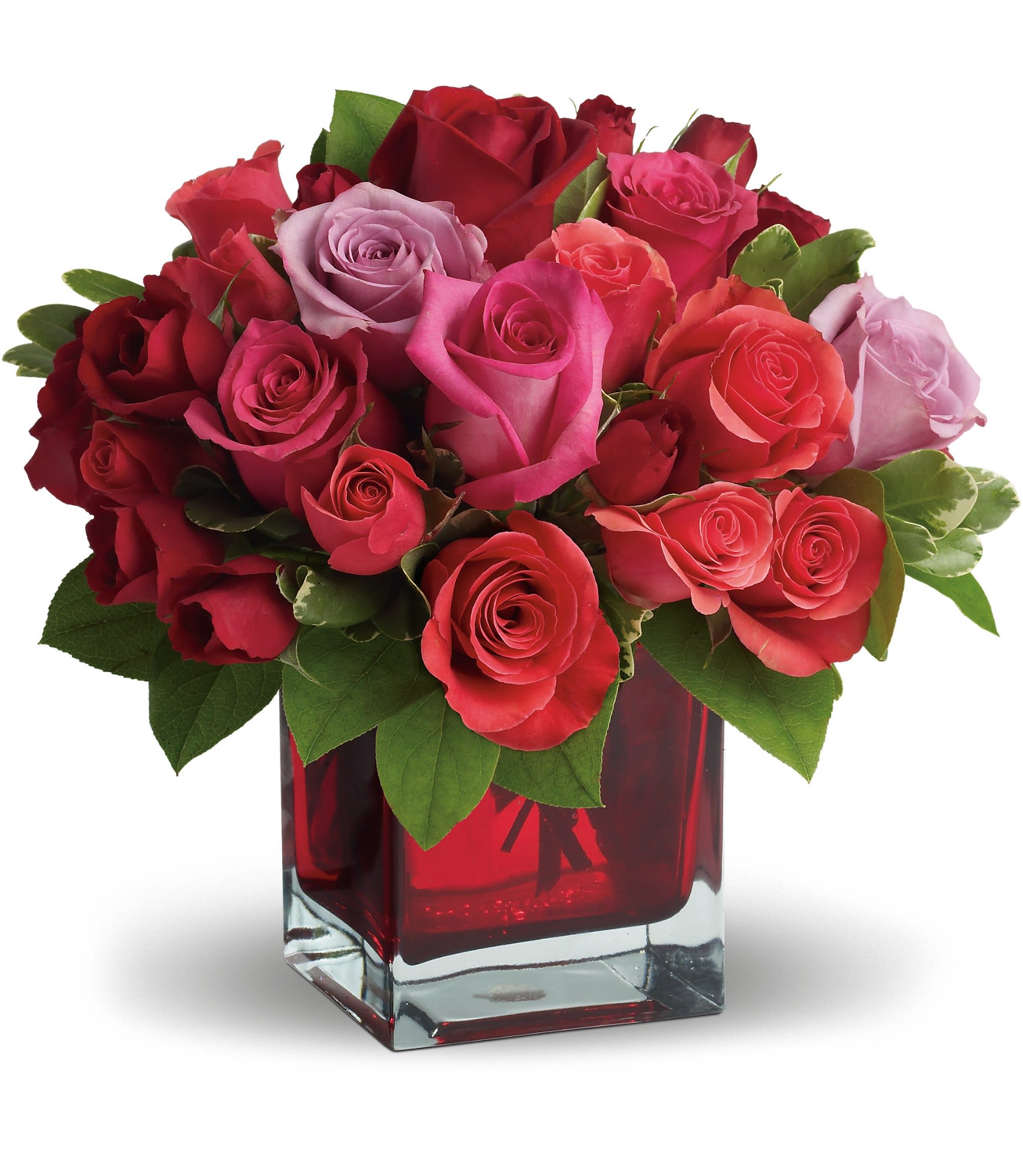 Madly in Love Bouquet with Red Roses by Teleflora - If you're crazy about someone and not afraid to show it, this bright jewel-toned arrangement is the perfect way to express your love.    Lavender, red and hot pink roses along with coral and red spray roses arranged in a red-hot cube vase are an absolutely beautiful way to get your message across.    Approximately 11" W x 10" H    Orientation: All-Around    As Shown : T9-3A  Deluxe : T9-3B  Premium : T9-3C