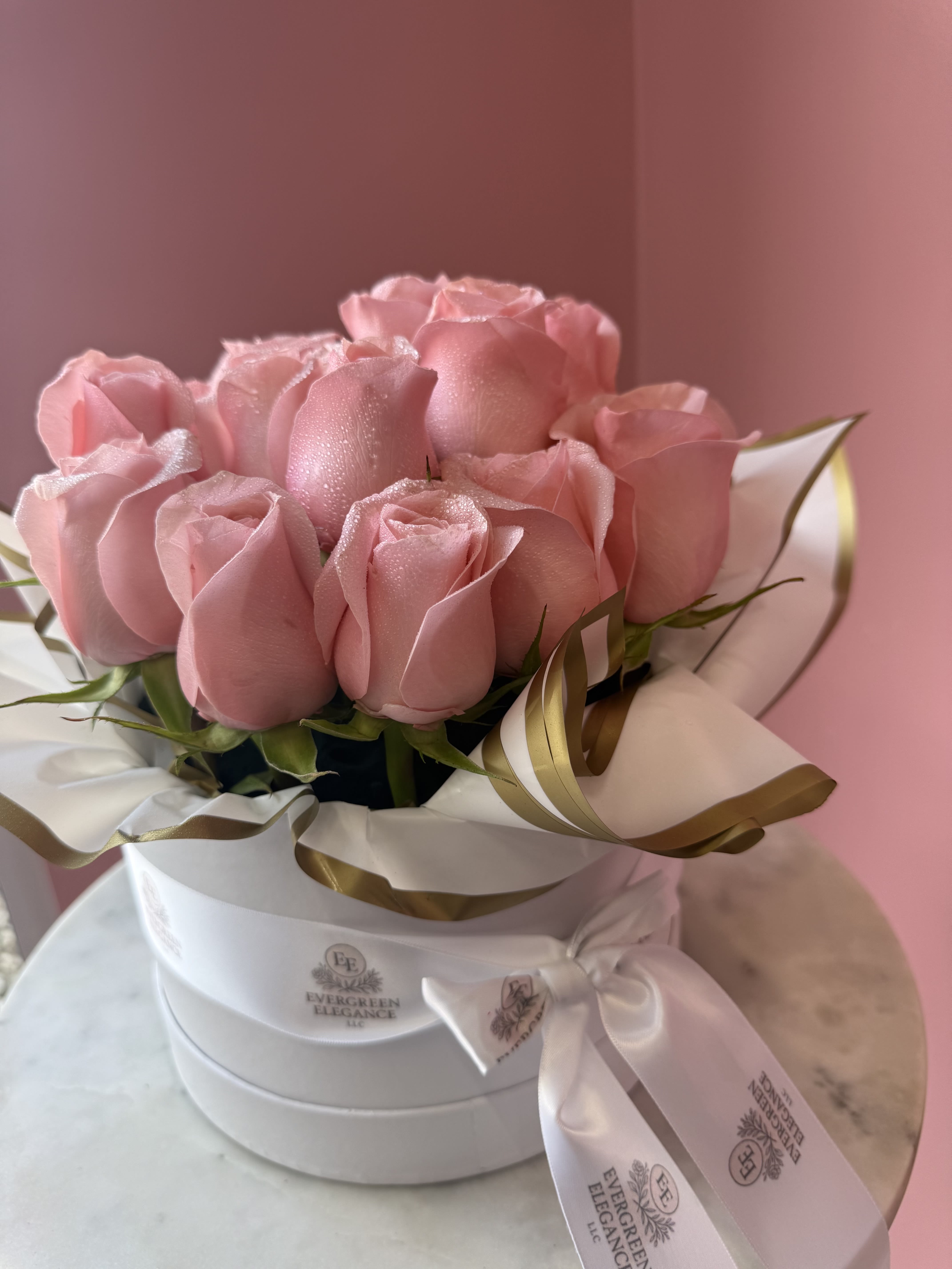 The Coquette Box - Pink roses presented in a "hat box" style arrangement.