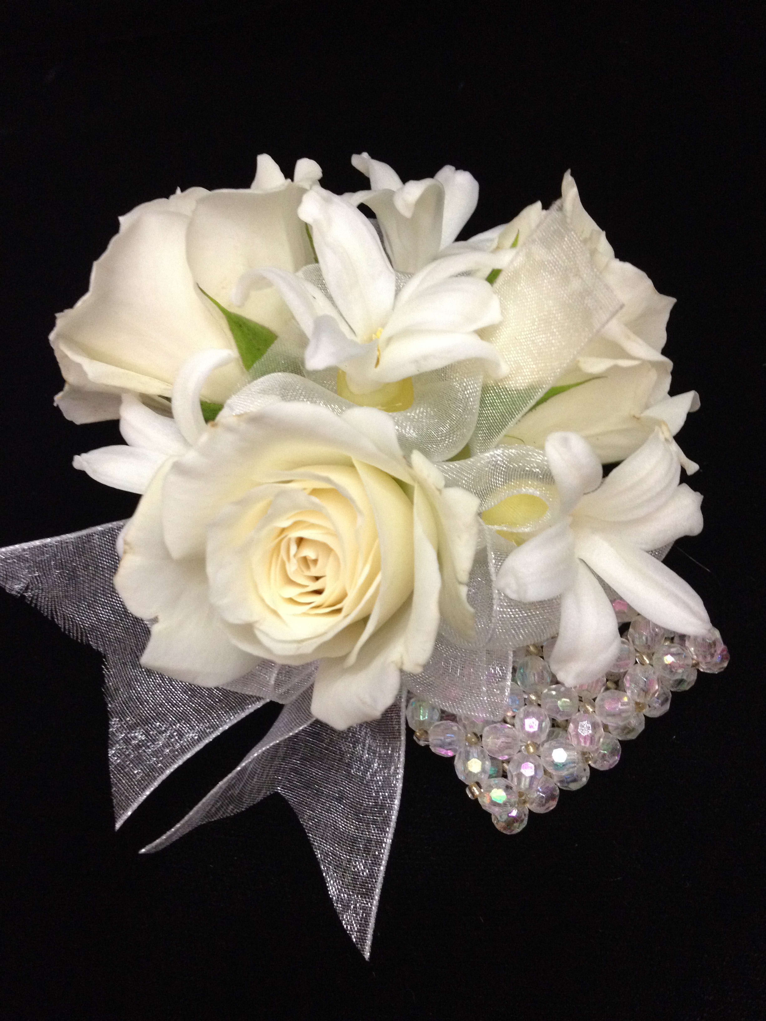 Wrist corsage - It's that time to order prom corsages You may change the color of the rose, and ribbon. Just let us know in special instructions!