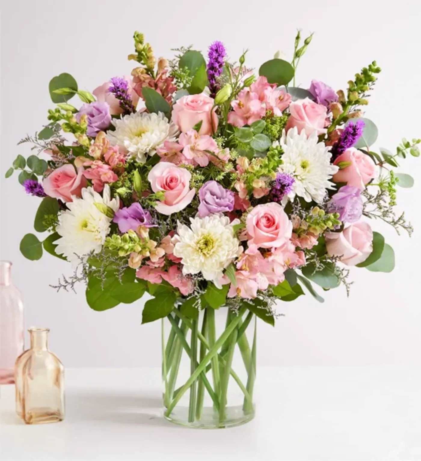 Floral Meadow for Mom  - Our local florists put love into every arrangement. Sometimes they have to substitute flower types, colors &amp; containers to give you the freshest blooms available. Although your bouquet may vary from the photo shown, we promise your recipient will love it just as much!
