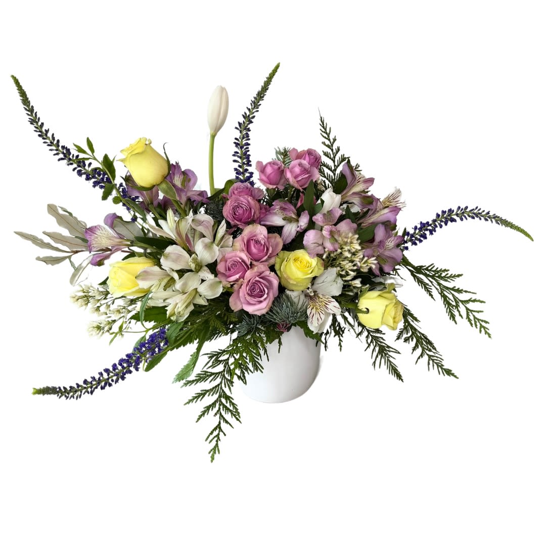 Amethyst Blooms - A gorgeous mix of roses, tulips, alstroemeria and seasonal greens.