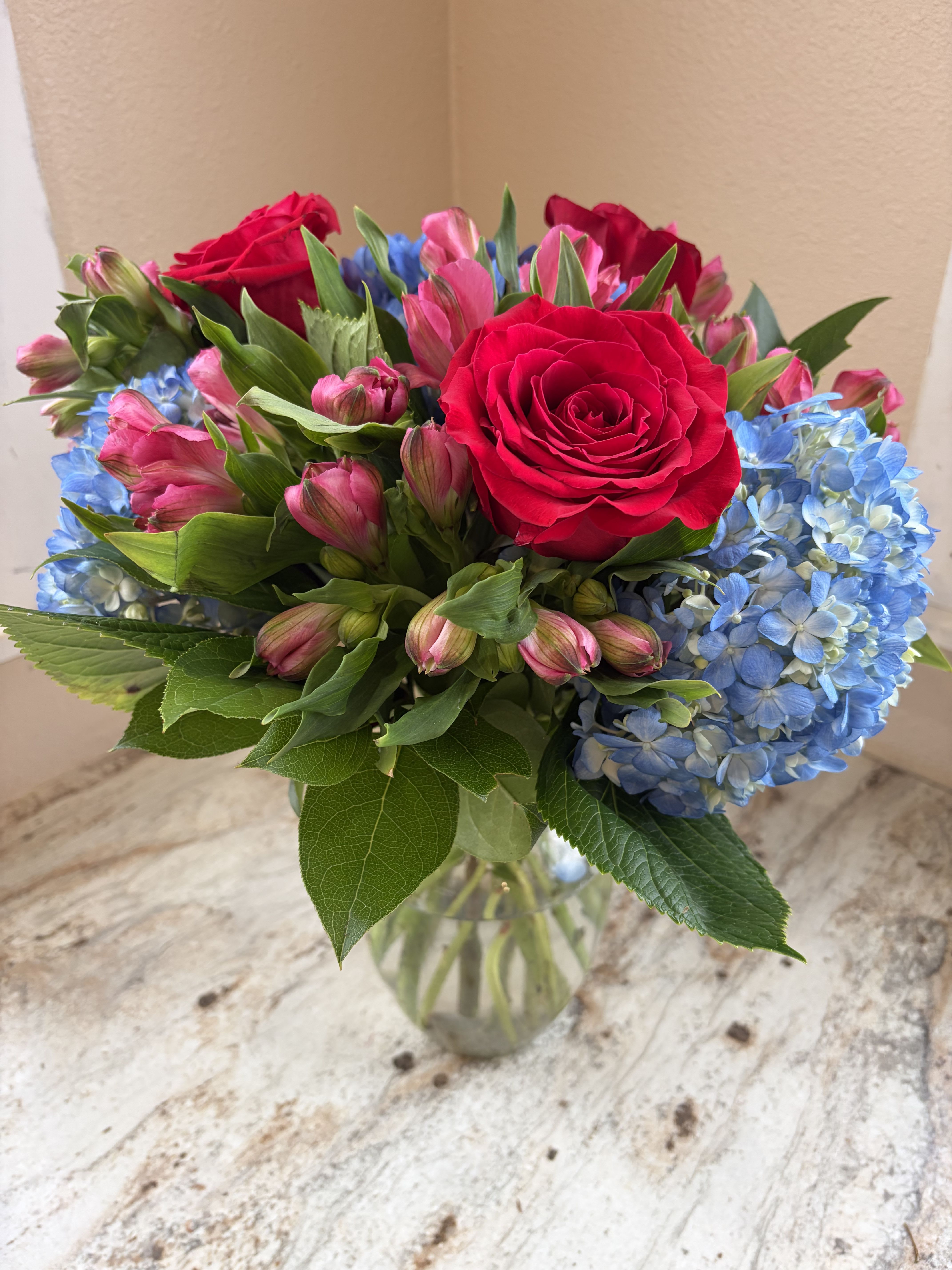 Have a Ball - Beautiful blue Hydrangeas, vibrant red Roses....How can you go wrong?