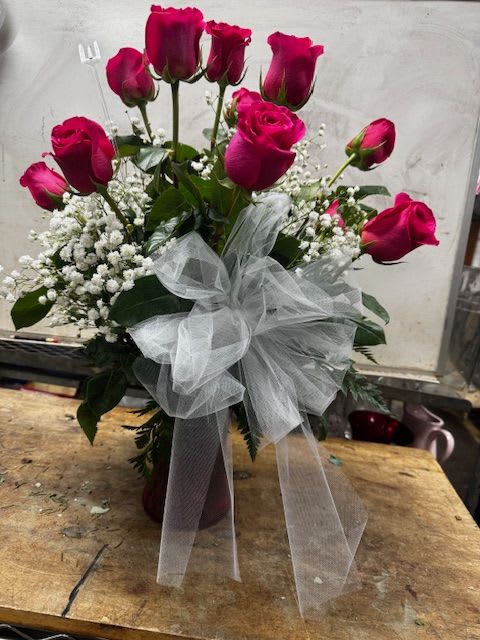 Rose Special - We are running a special on colored roses arranged in a vase. This special excludes red roses.   LOCAL DELIVERY ONLY 