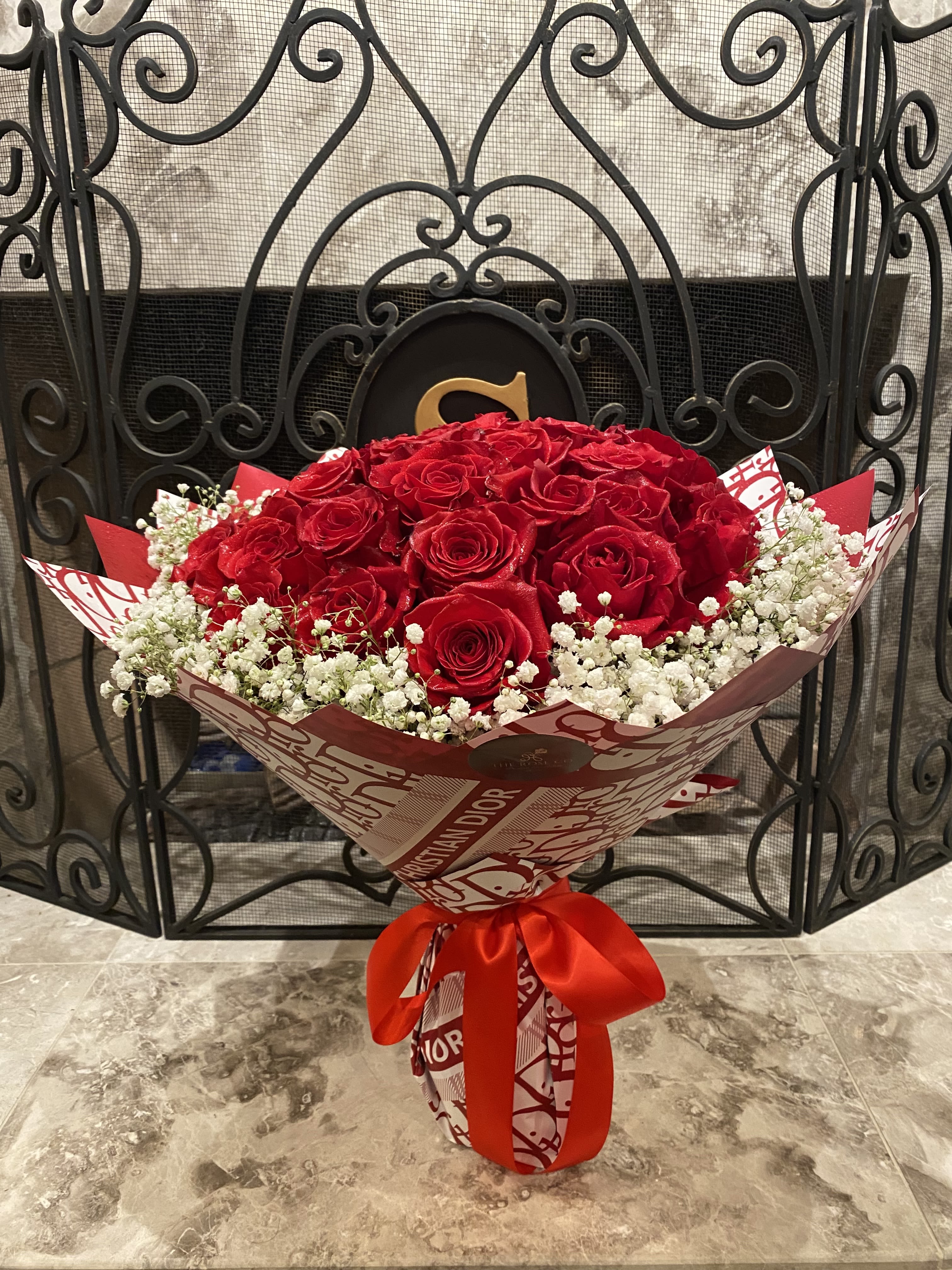 36 Red Roses With Baby Breath  - fresh cut  16''H  Warm reminder: this bouquet has been treated with flower preservatives and dose not need to be placed in a vase. 