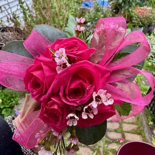 Perfect Match Corsage - Bring a swatch of your dress and we will match it!  Bold and beautiful or just a hint of color.  You decide and we will make your dreams come true!