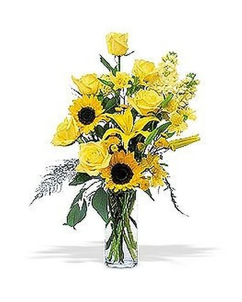 Yellow Roses &amp; Sunflowers - Whether you want to light up someone?s world or brighten their day, this brilliant arrangement will do just that. Roses, sunflowers and chrysanthemums in a classic clear vase. 