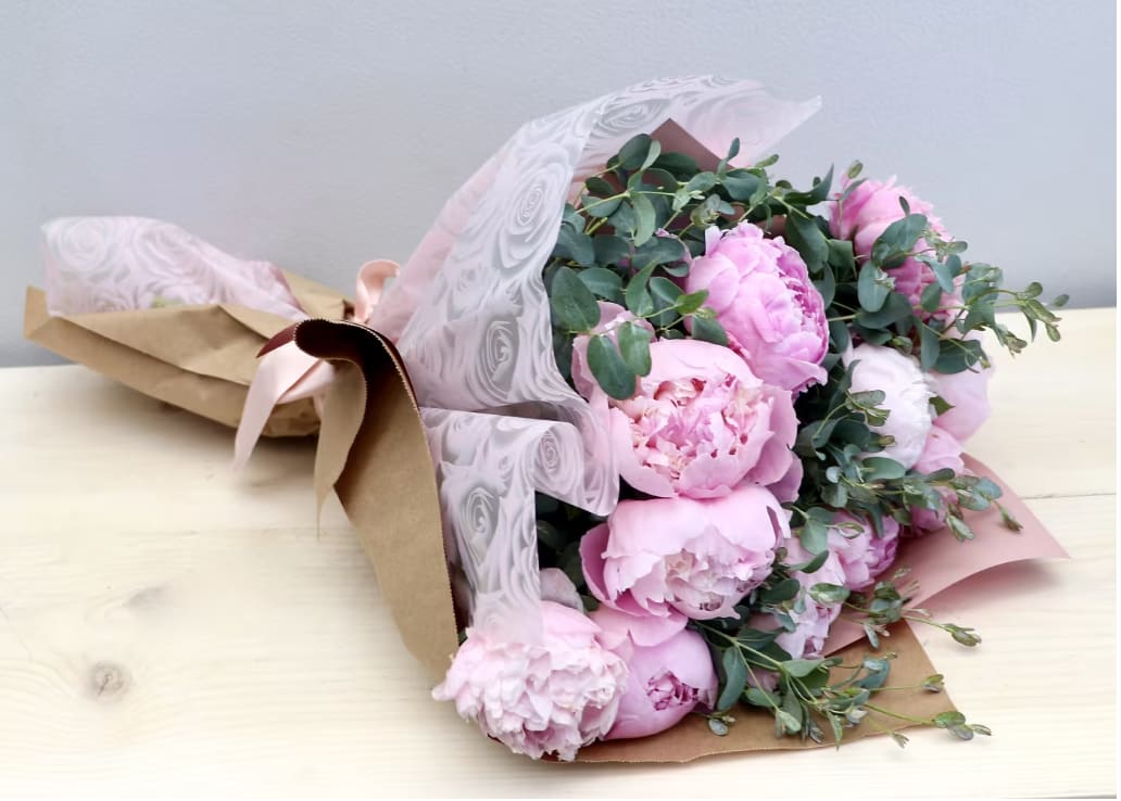 Pink Peony Bouquet - WeHo  - he standard size holds 6 peonies with seasonal greenery. The photo shown is in the DELUXE size with 12 and premium has 18.