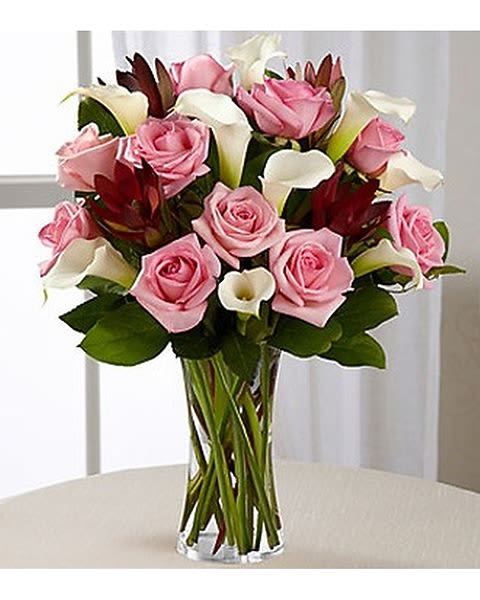 Fabled Beauty - Picked fresh from the farm to delight your special recipient with its sweet sophistication, our Fabled Beauty Rose &amp; Calla Lily Bouquet is blooming with gorgeous grace to celebrate all of life's most treasured moments. Hand gathered in select floral farms and showcasing the winning color combination of pink and white, this stunning flower arrangement has been picked fresh for you to help you celebrate a birthday, anniversary, or the birth of a new baby girl. 