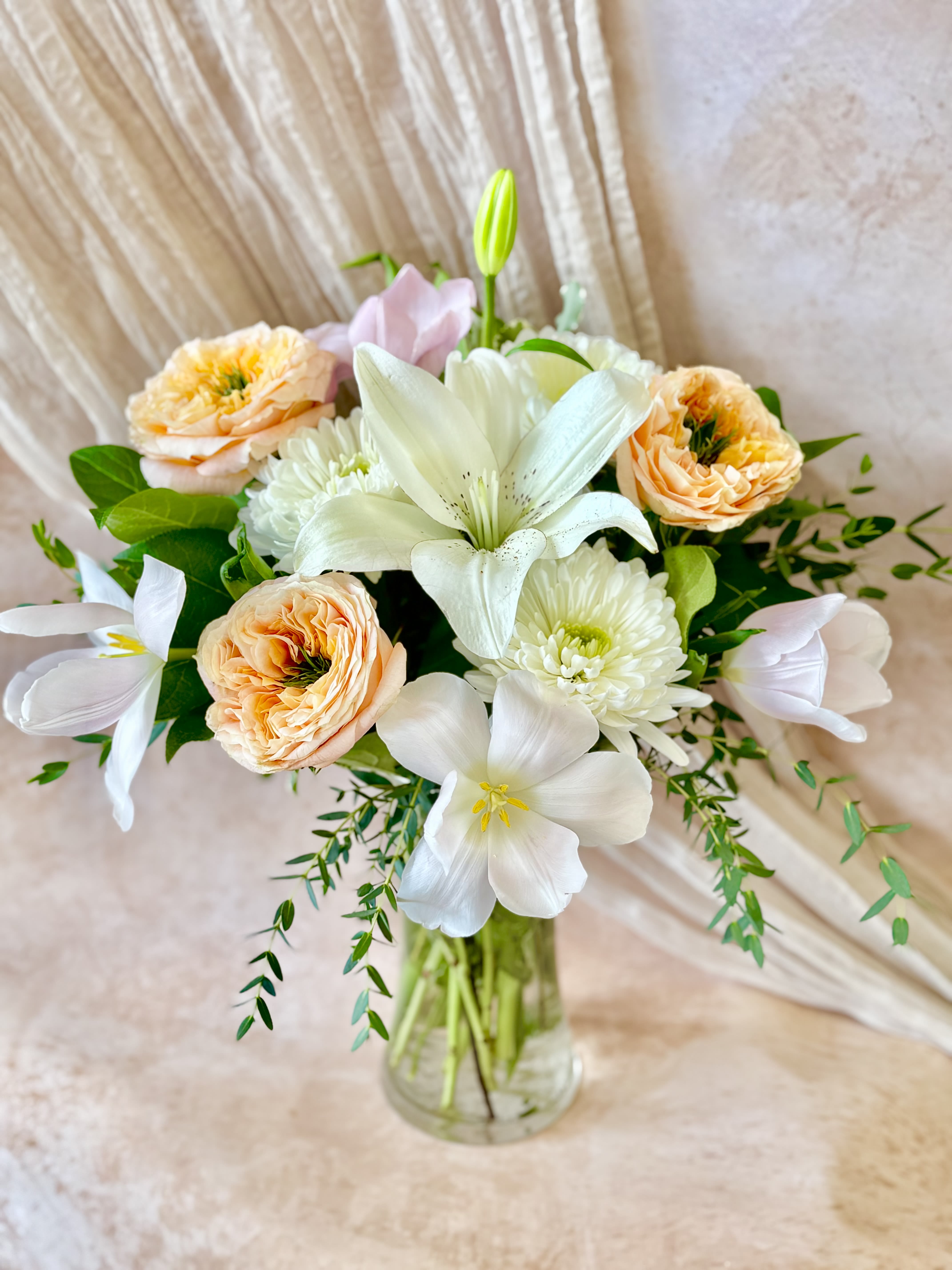 Soft Radiance - Additional flowers will be added to enhance the bouquet.