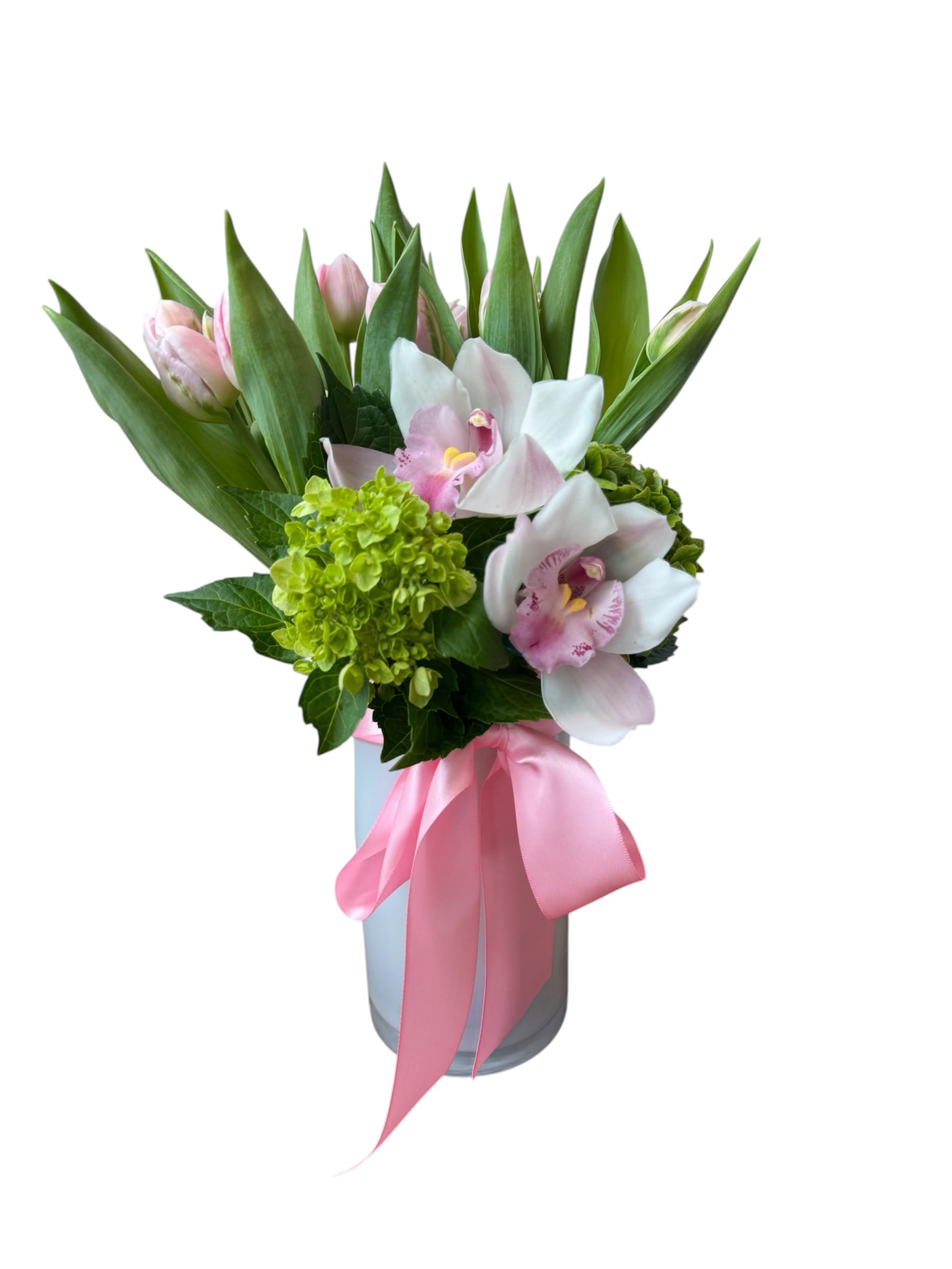 Mom's Favorite Blooms  - Pink tulips, green hydrangeas and white orchids designed in a skinny tall white glass vase. As shown in photo.