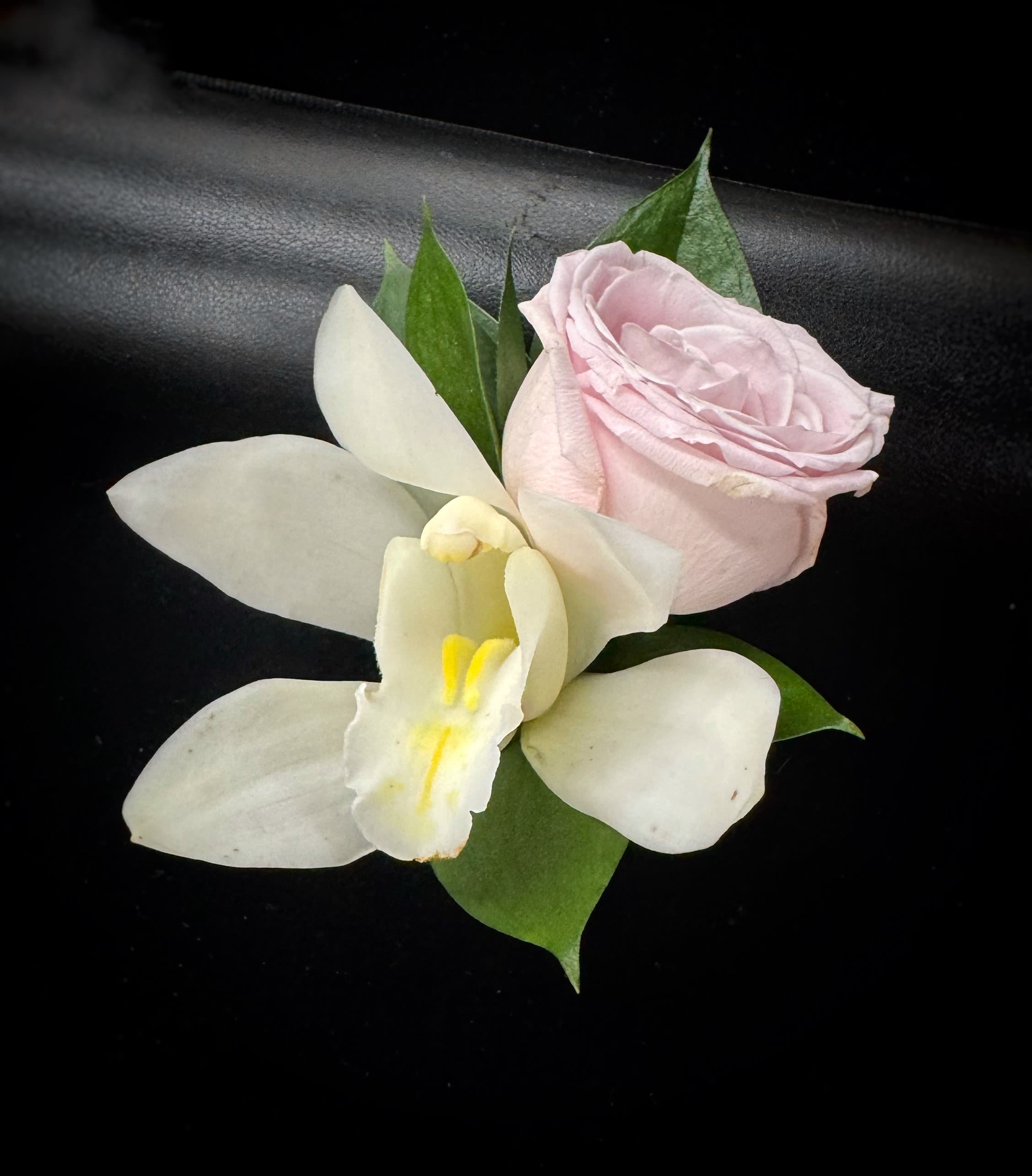 Men's Boutonniere- pin on - A pin on boutonnière with a mini cymbidium orchid and a small spray rose.  ****Please note what color of rose you'd prefer- yellow, red, hot pink, light pink or yellow