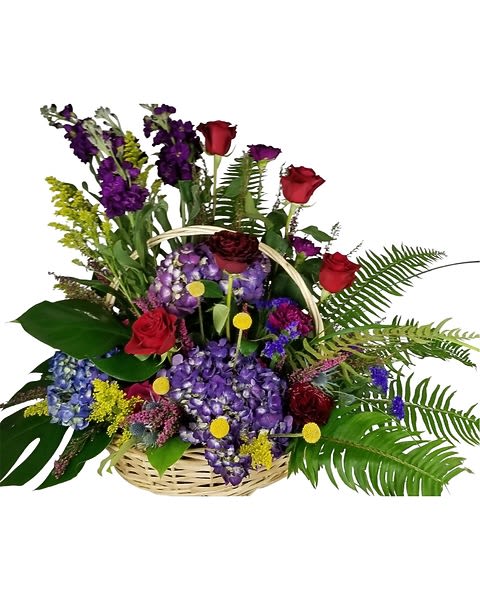 Basket arrangement with purple hydrangeas, red roses, tall purple flowers and lush ferns.