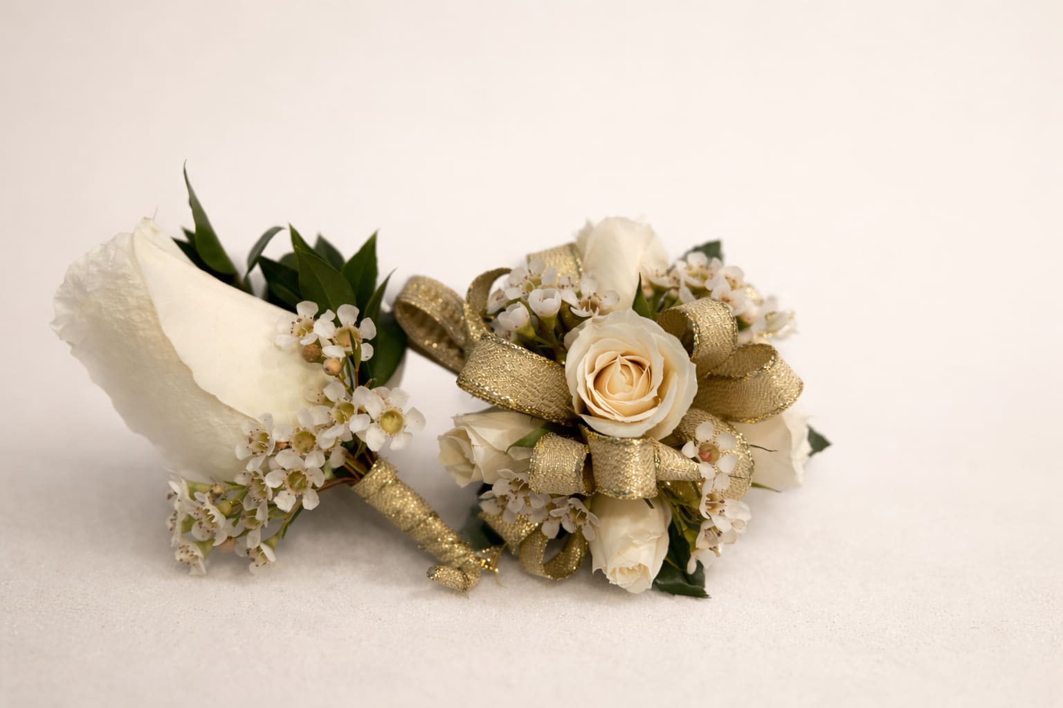 Matching Corsage and Boutonnière  - Corsage and Boutonniere matching set. The same flowers, filler and ribbon will be used for the set.  We will contact you to confirm the colors of your ribbon and flowers. 