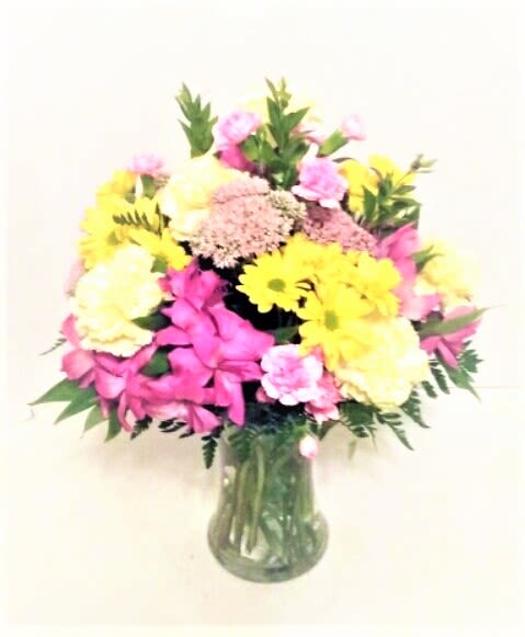 A Special Mix - A beautiful mixture of colorful, long lasting flowers. Perfect for a joyous occasion with daisies, carnations, mini carnations, alstroemeria, colorful fillers and dark greenery. Some flowers and colors may vary.