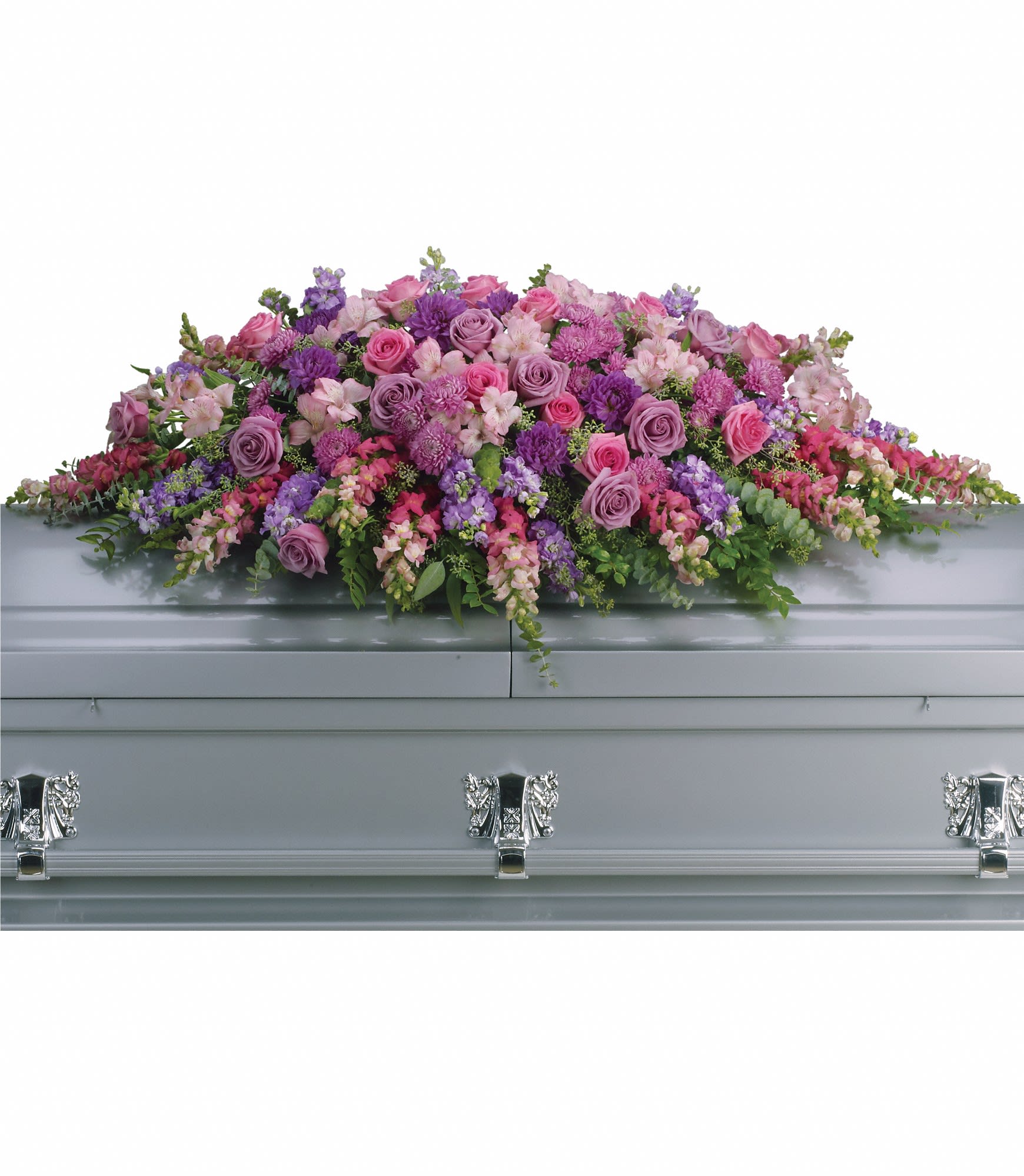 Pink and purple floral casket spray arranged on a silver casket