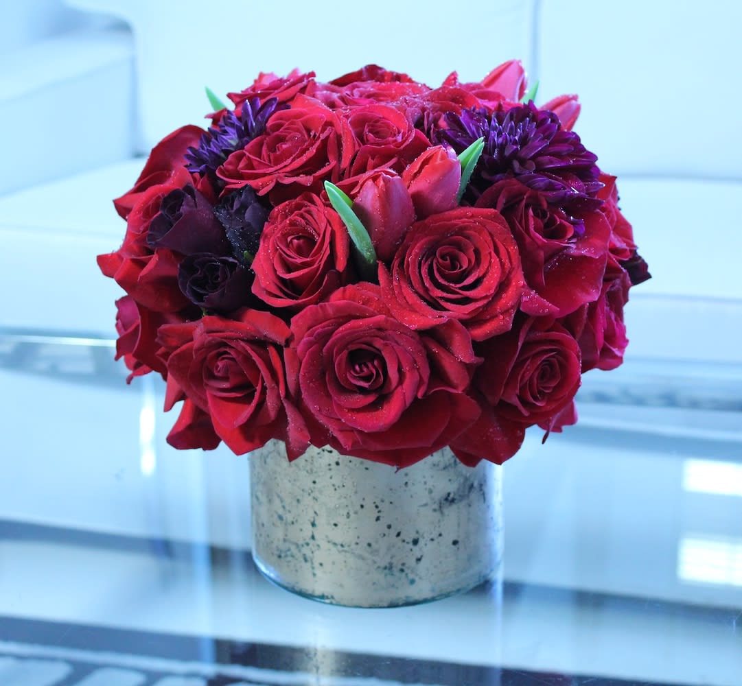 Old Hollywood - Red Roses and burgundy Chrysanthemums with accents of red Tulips in an antique-style golden mirrored glass vase