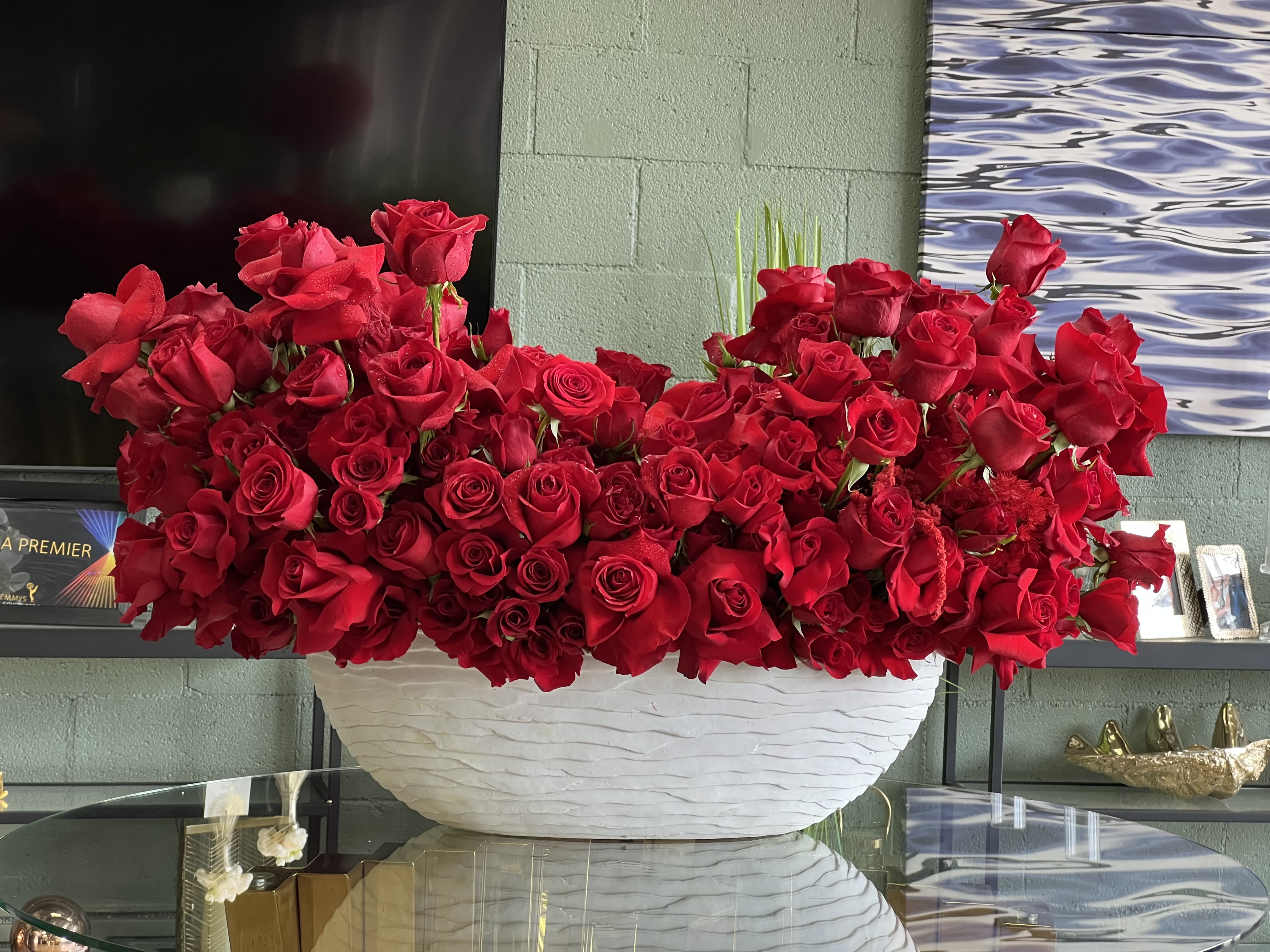 Contemporary Romance  - 300 red Roses, artfully arranged in a ceramic vase