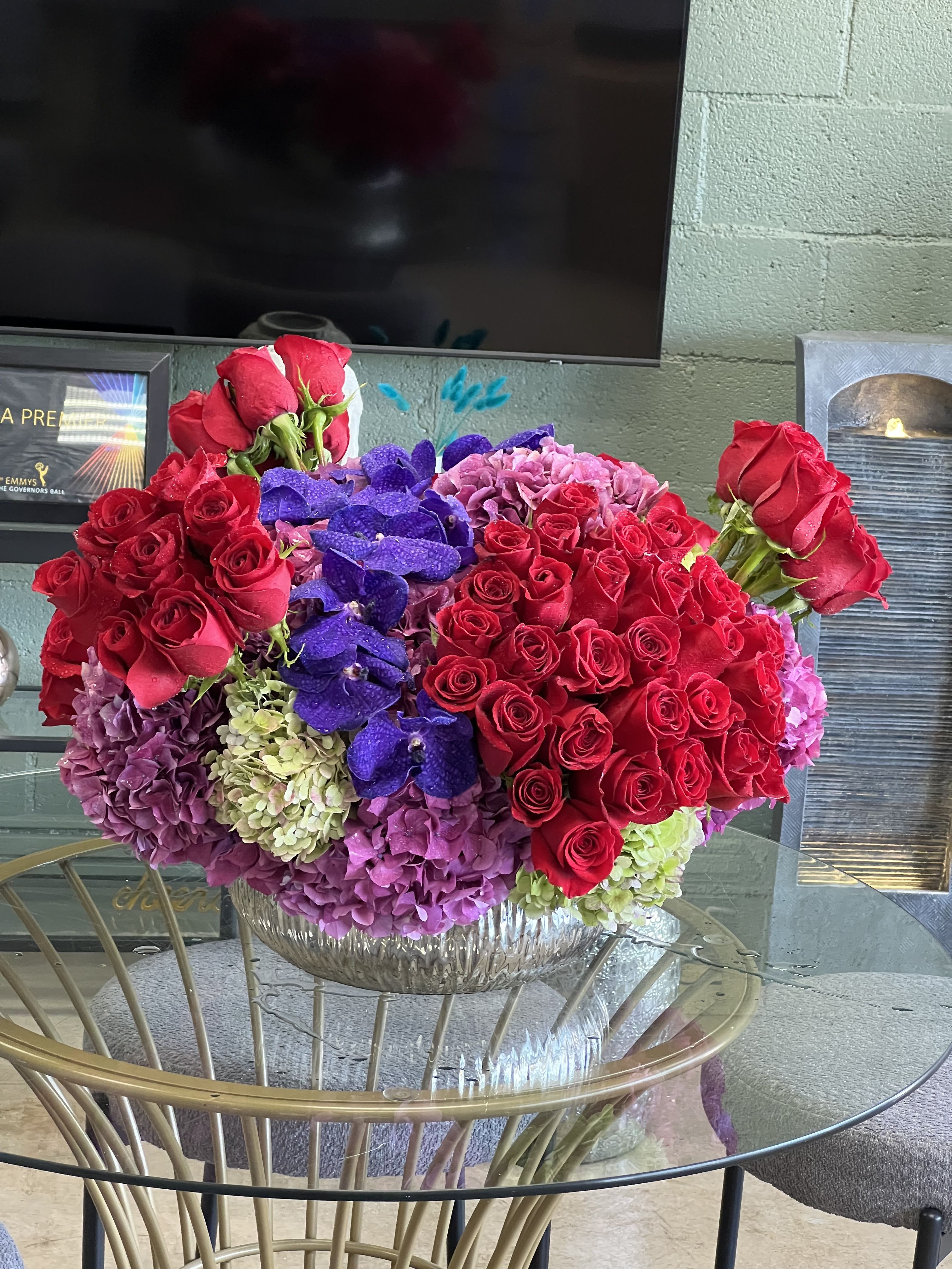 Jordan  - A magnificent arrangement of Roses and Orchids, set in a bed of Hydrangea
