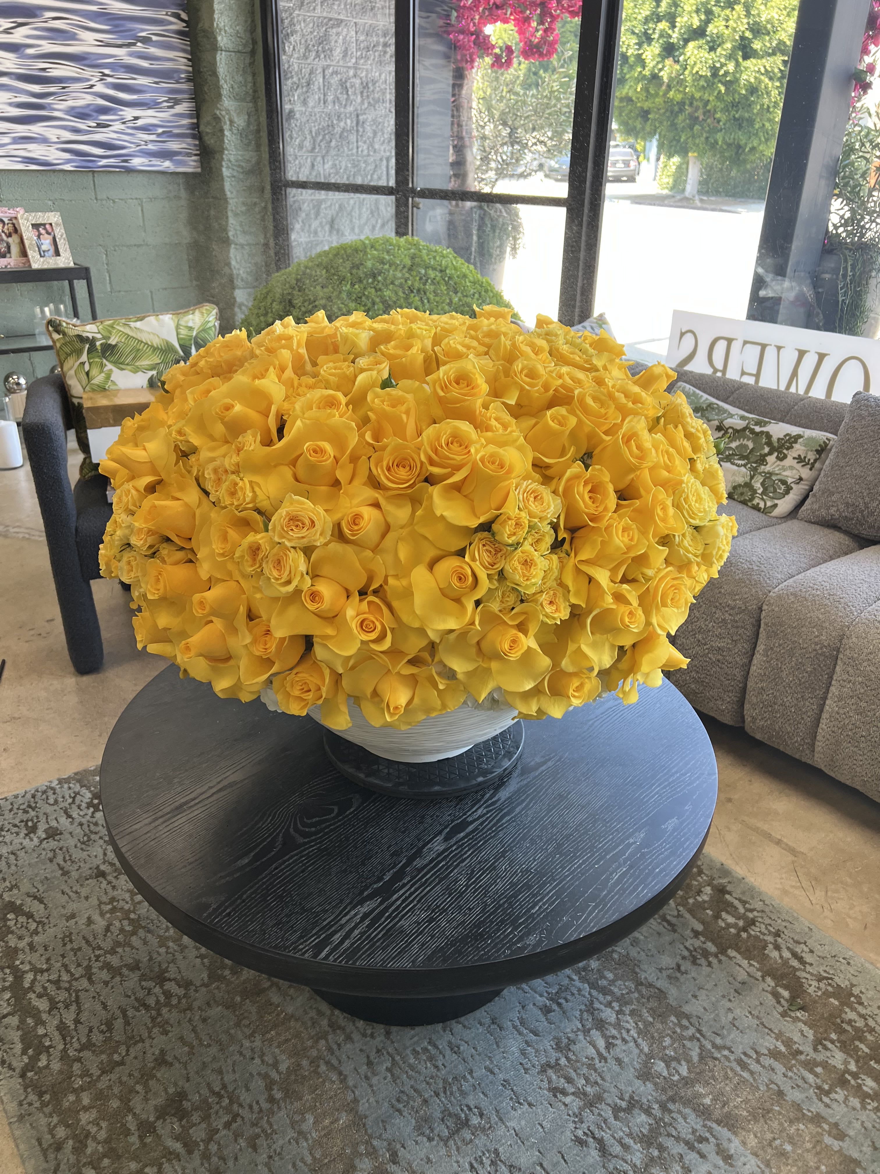 Athena - Brighten your day with this dazzling arrangement of reflexed yellow Roses!