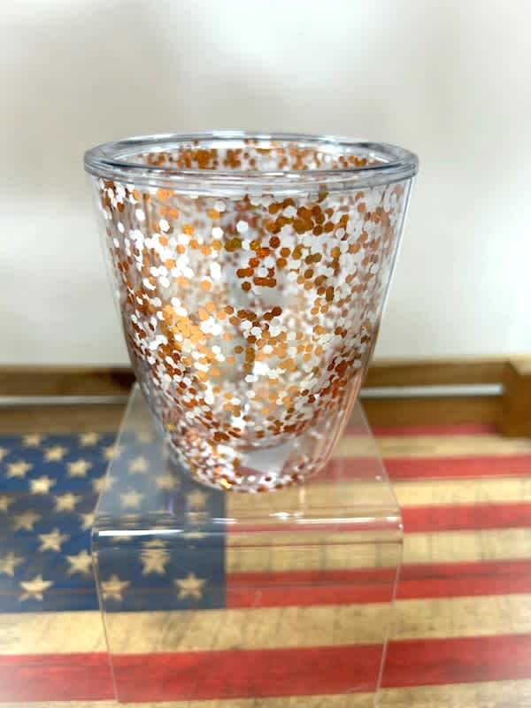 Clear glass vase with copper and white confetti pattern
