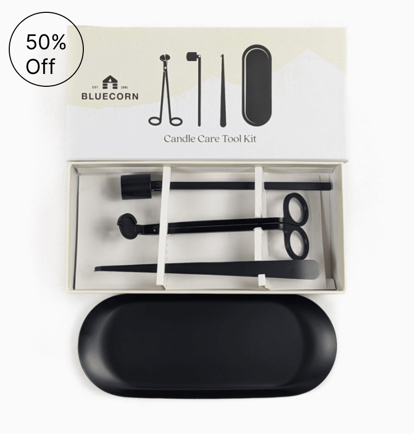 Candle care tool kit in a box with black tools and tray