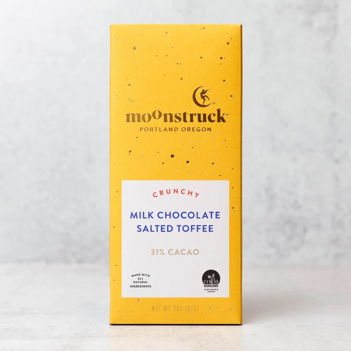 Yellow box of Moonstruck milk chocolate salted toffee