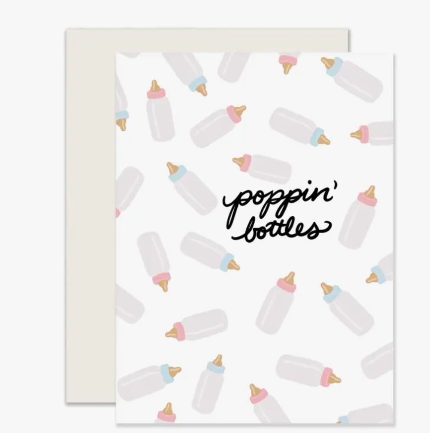 Greeting card with baby bottle pattern and "poppin' bottles" text