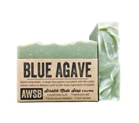 Green 'Blue Agave' bar soap with kraft paper label and a second textured soap bar behind it
