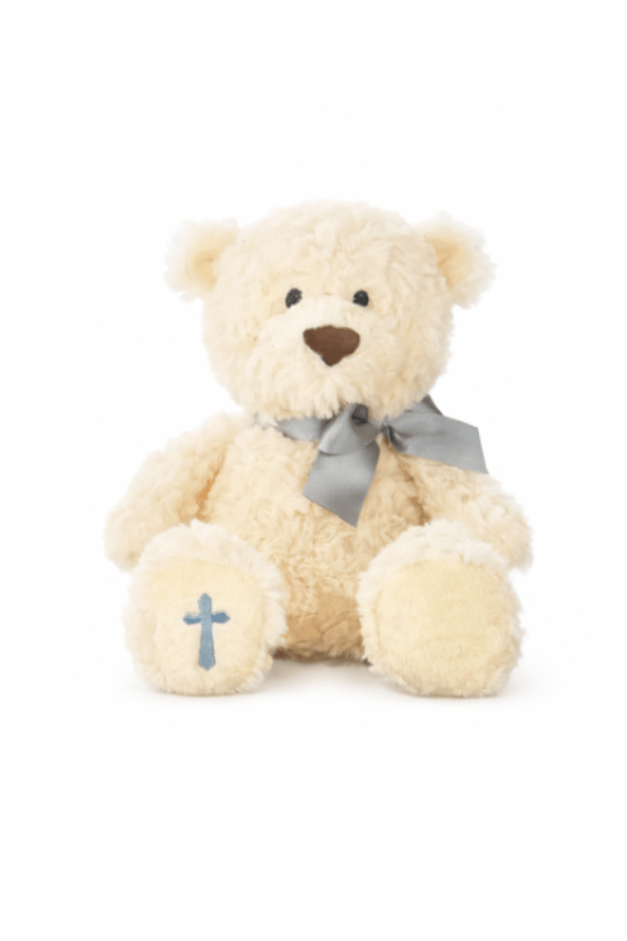 Cream plush teddy bear with a gray bow and a blue cross on one paw.