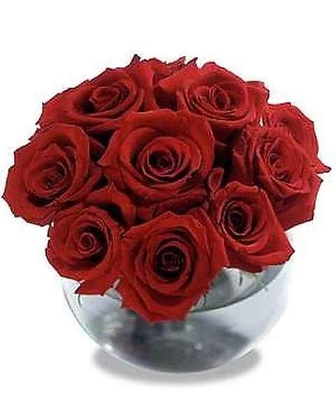 Contemporary™ Rose Bouquet - Similar to the bouquets used in home decor and design magazines, we have created this contemporary bouquet of a dozen roses in a globe shaped glass vase. Available in red, pink, yellow, white or peach. Simple and stunning; this bubble bowl of lush red roses is an extraordinary way to impress your loved one. 