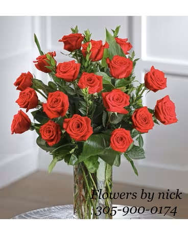 Bouquet of red roses in a clear glass vase