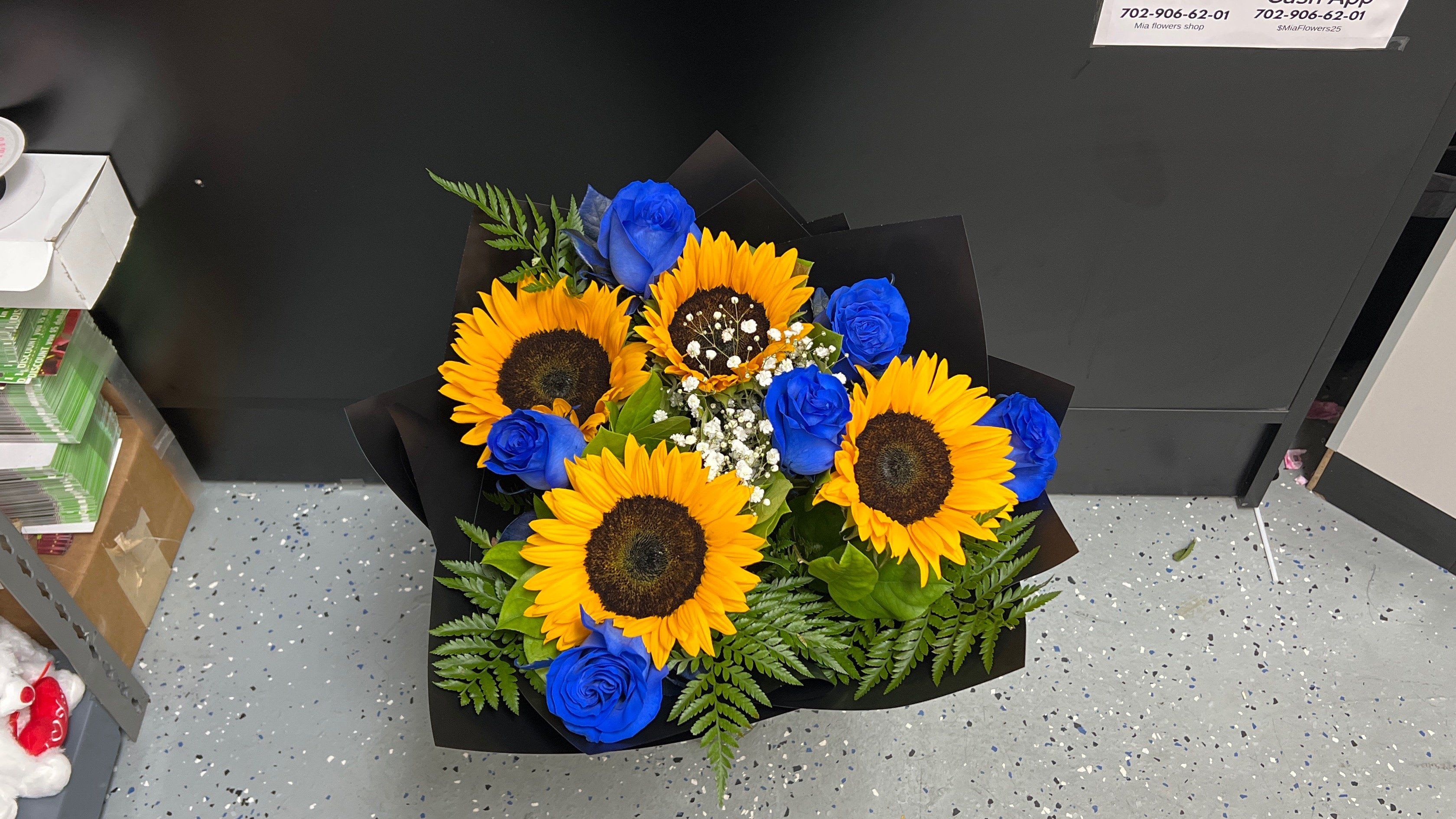 Blue roses with sunflowers - 6 Blue Roses  4 Sunflowers Paper design will vary but the primary color will be black. 