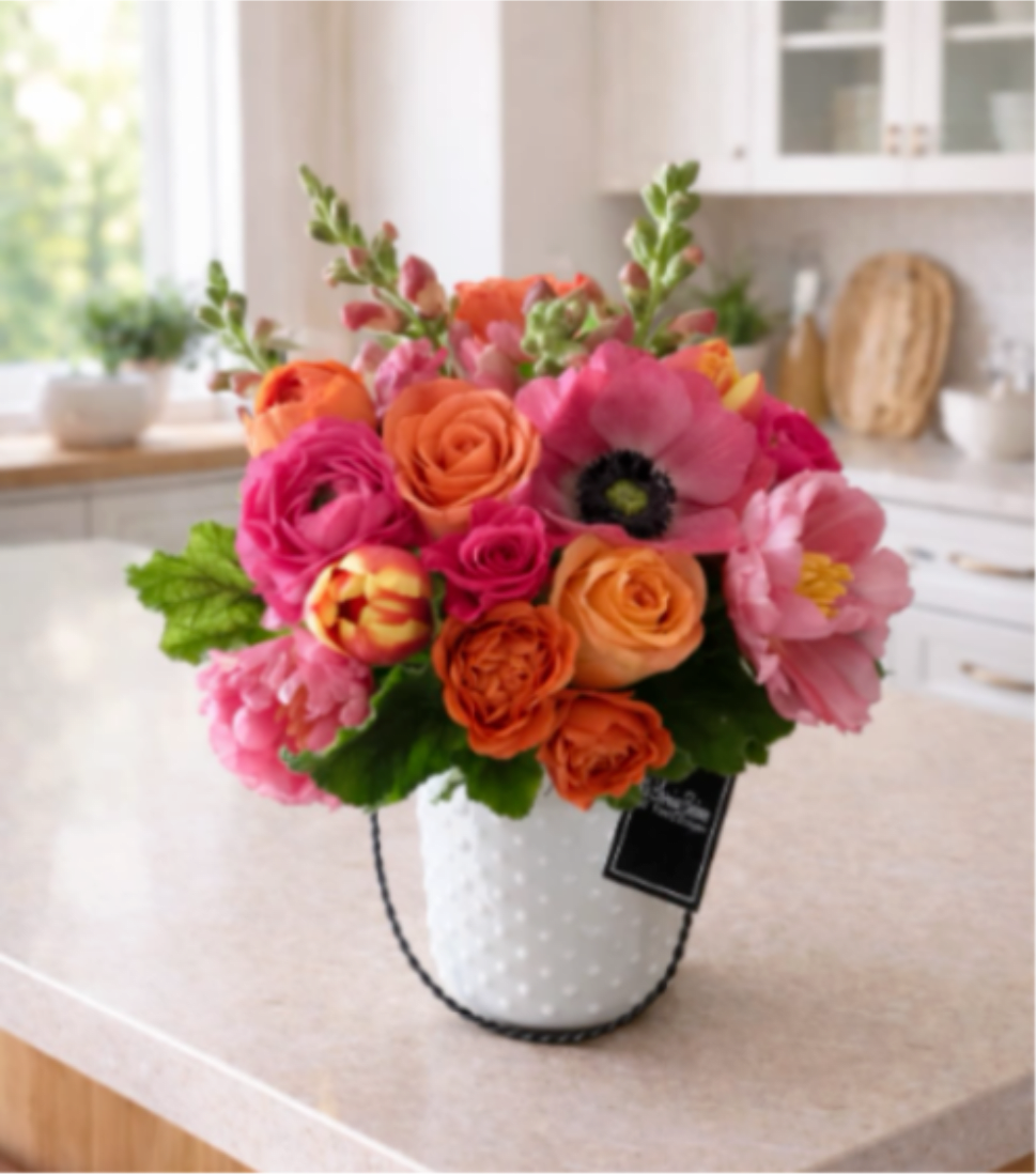 Sweet Thoughts    - Our Sweet Thoughts Bouquet is an arrangement that is vibrant in color  filled with Hot Pink and Orange Roses, Snapdragons, Tulips, and Lisianthus in a white mason jar. Perfect to send to send cheerful thoughts or just because. Looks great on desk if your looking to send to someone at work!  Perfect for all occasions 