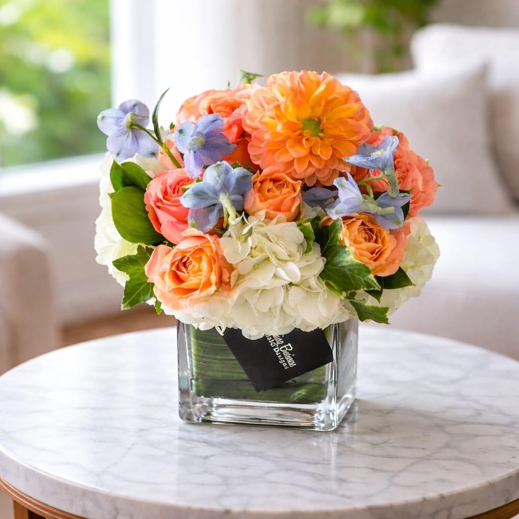 Dottie Arrangement – by My Blooming Business - Dottie Arrangement – by My Blooming Business Soft, elegant, and effortlessly charming, the Dottie Arrangement is designed to make a lasting impression. Featuring a delicate palette of peach and white florals, this arrangement exudes warmth and grace. Thoughtfully accented with a touch of soft blue, Dottie brings just the right amount of contrast for a look that’s fresh, refined, and unforgettable.  Whether you’re sending love, celebrating a special moment, or simply brightening someone’s day, Dottie has all your bases covered.  Expertly crafted by My Blooming Business, a top-rated florist in Los Angeles, with 5-star reviews on Google and Yelp. We proudly deliver throughout Los Angeles, the San Fernando Valley, and the San Gabriel Valley.