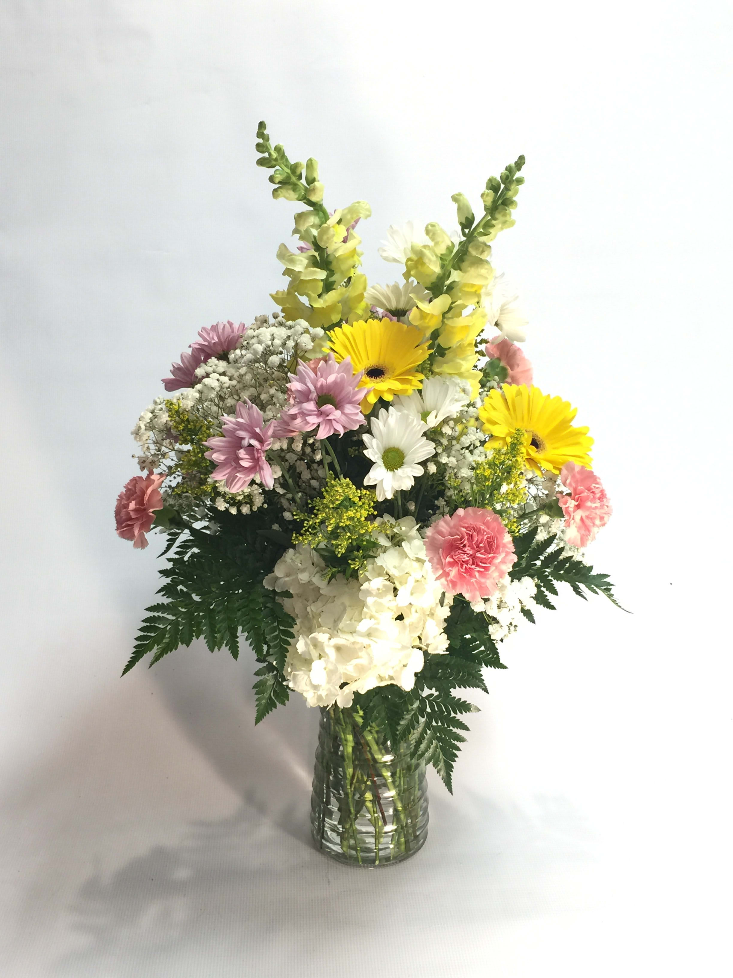 Cheryl’s garden vase arrangement - Beautiful Gerber daisies snapdragon pompons daisies and roses all arranged in a glass vase