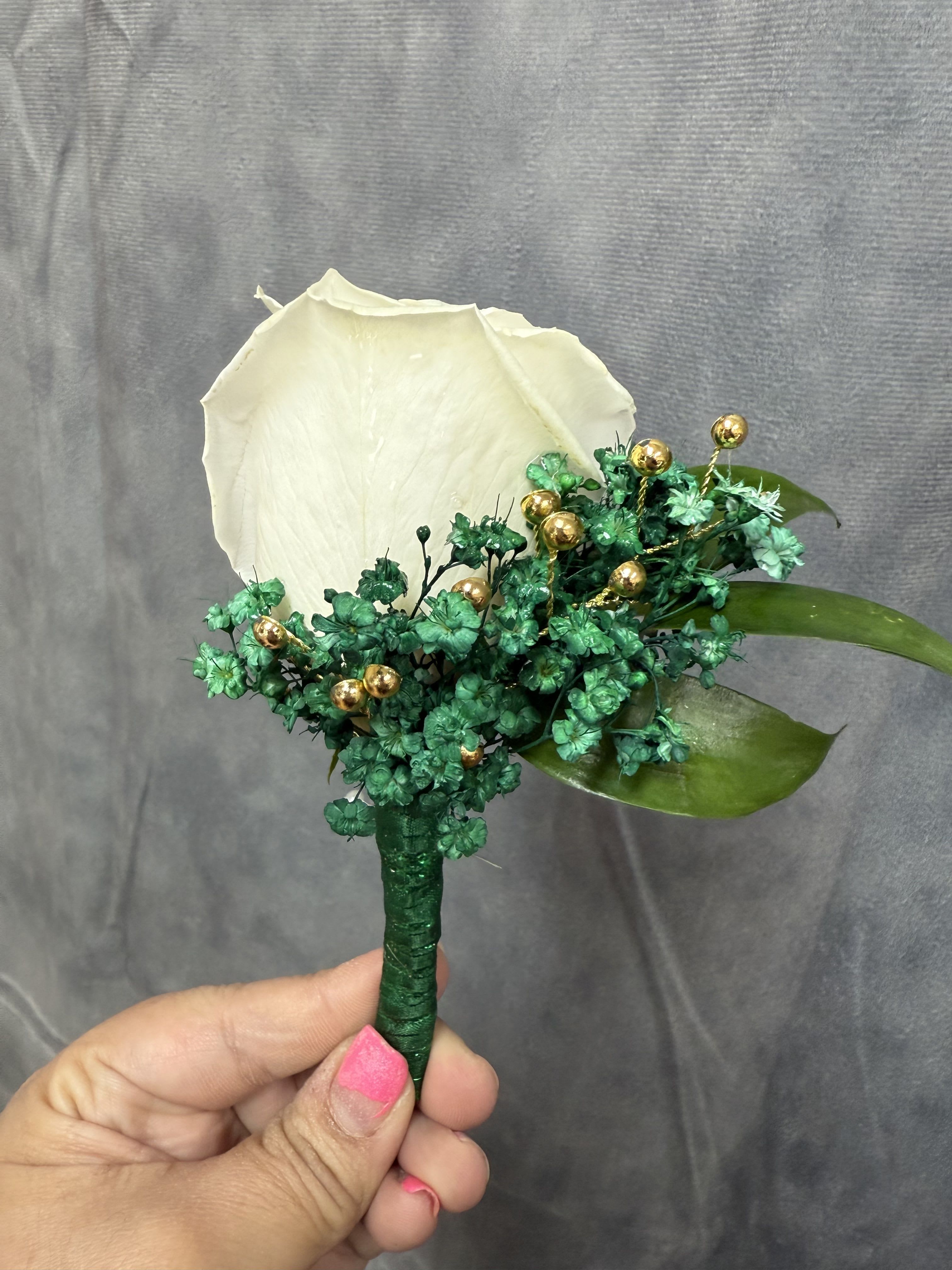 Emerald Green Gold - White rose with emerald green baby breath and gold accents boutonnière wrapped with emerald green 
