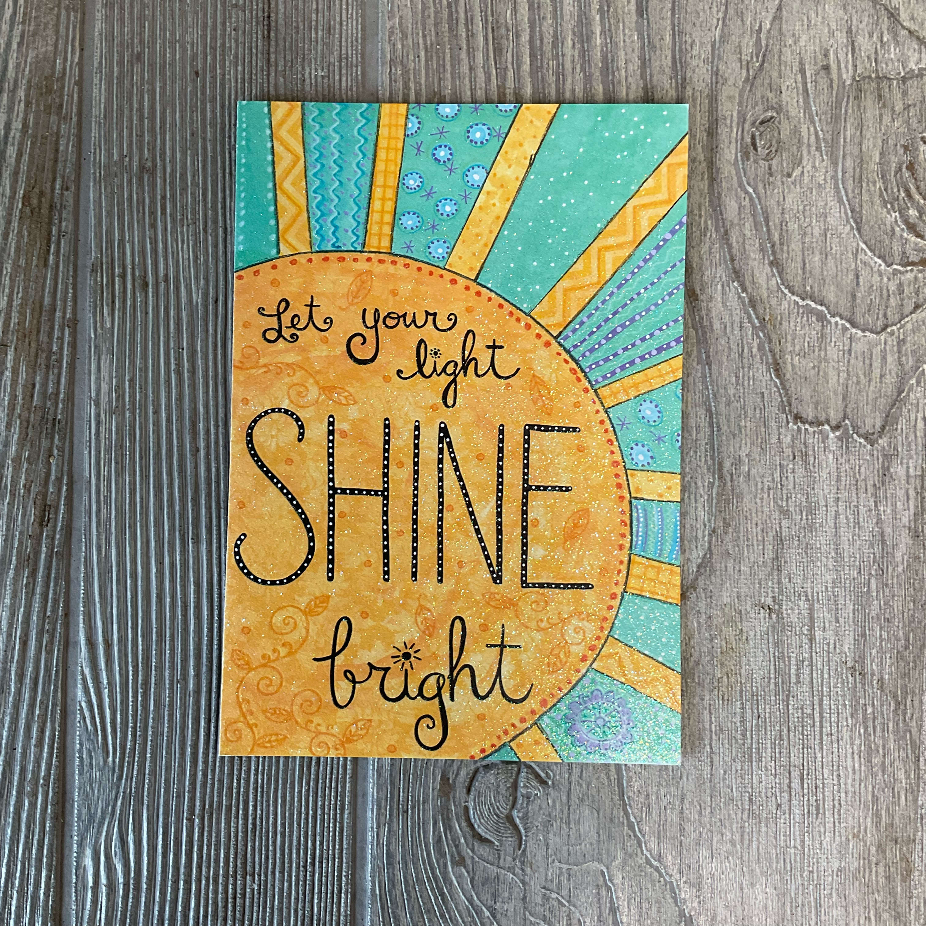 Let your light SHINE bright Graduation Card - Graduation card with the inside message "There's no limit to your AWESOMENESS! Congratulations, Graduate" Artist:Annie LaPoint