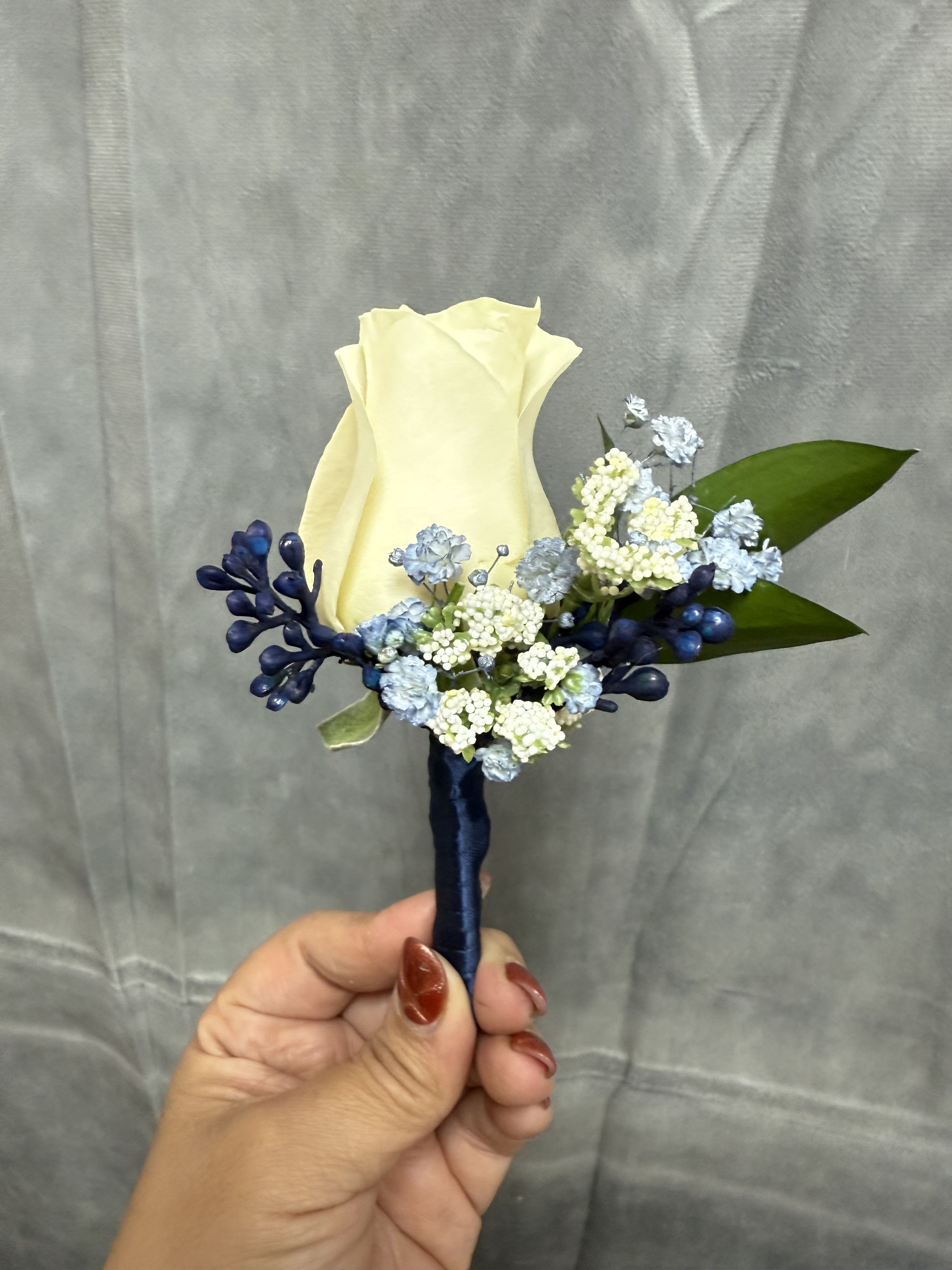 Baby blue Navy white rose boutonnière  - White rose with baby blue and navy fillers with navy wrap