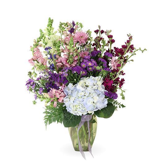 The Colors of Memories  - Elegant flowers convey heartfelt sympathy Soothing, beautiful blooms to honor obituary's spirit We support local florists by partnering with small businesses in the community Delivered with love, every arrangement arrives with compassion and care