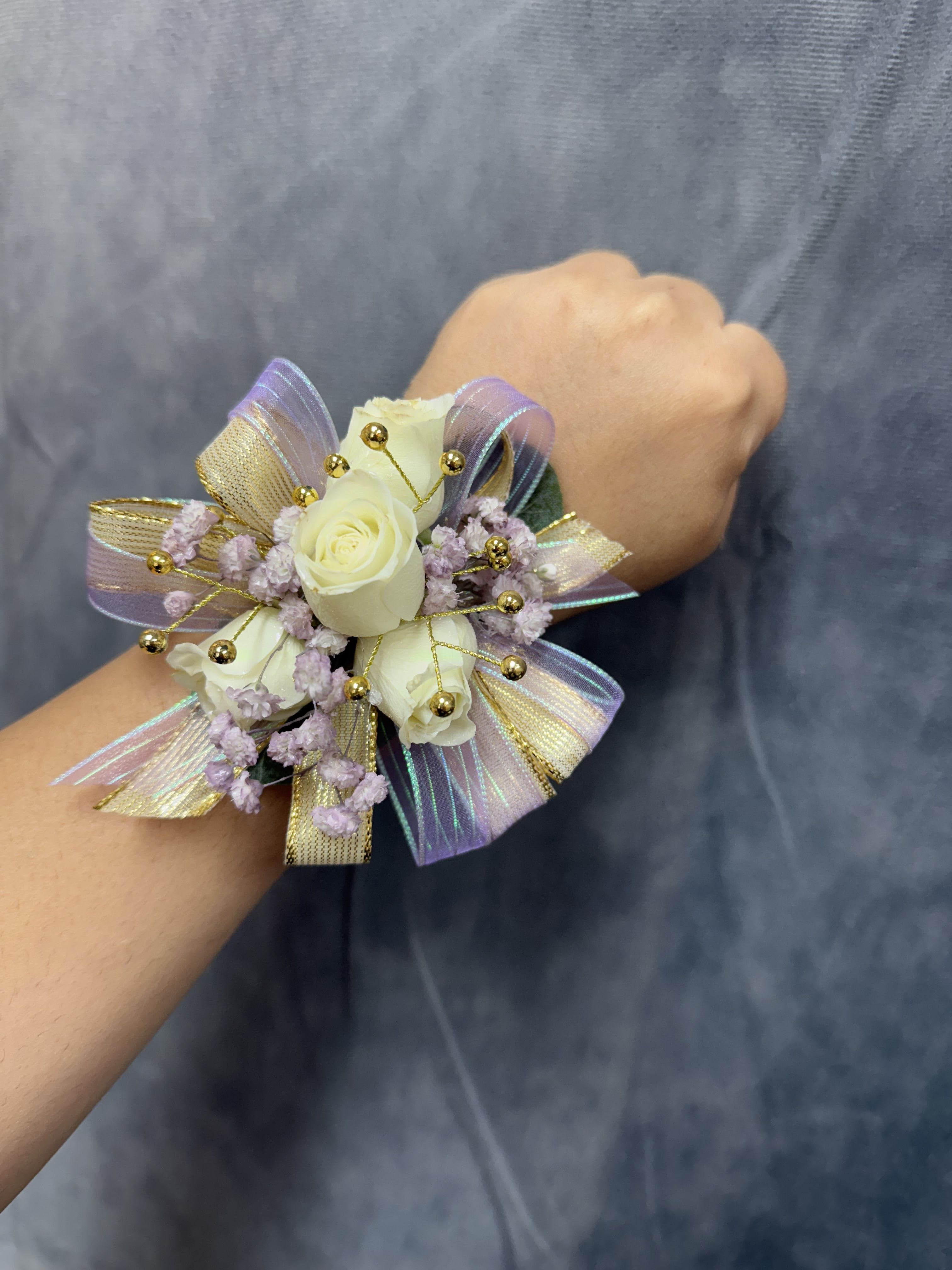 Lavender Gold White spray roses round corsage  - White spray roses with lavender gold ribbon with gold accents round corsage with pearl bracelet 