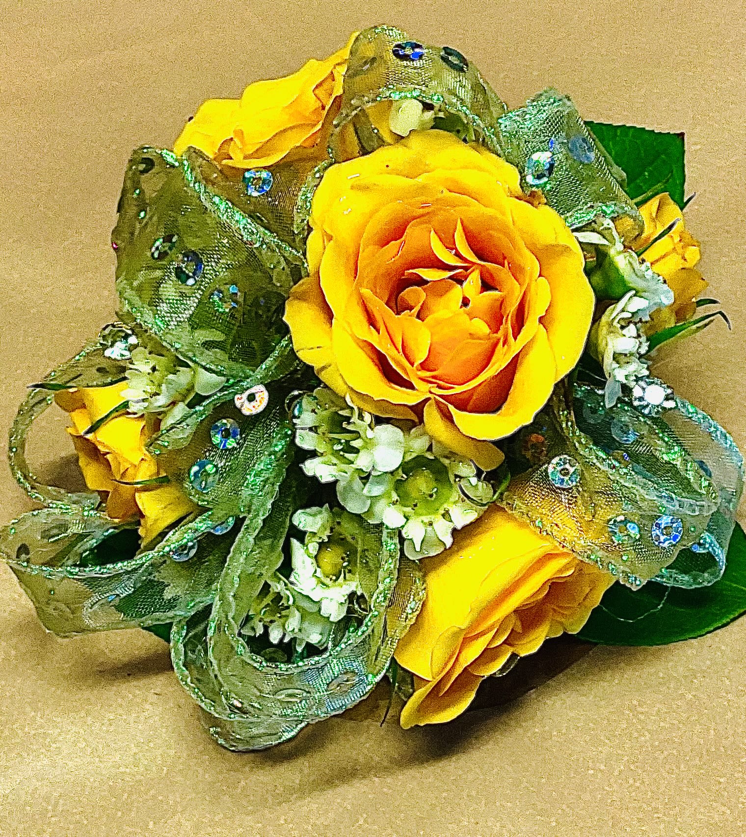 Yellow rose bouquet with green jeweled mesh ribbon