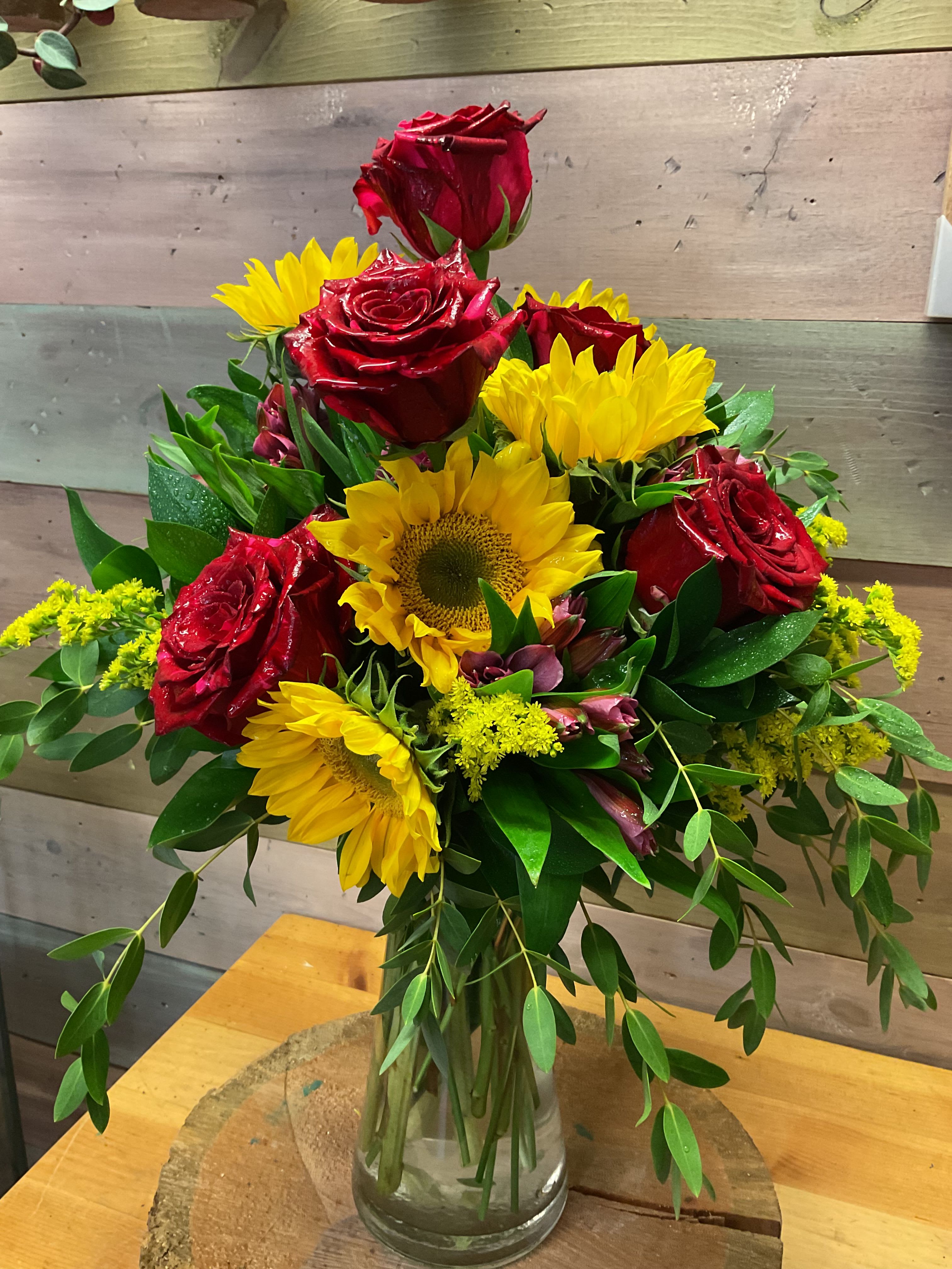 I Love Sunflower and Roses - A sunflower and rose arrangement is the perfect combination of vibrant, rustic, and chic, a bouquet that blends cheerful adoration with classic love.