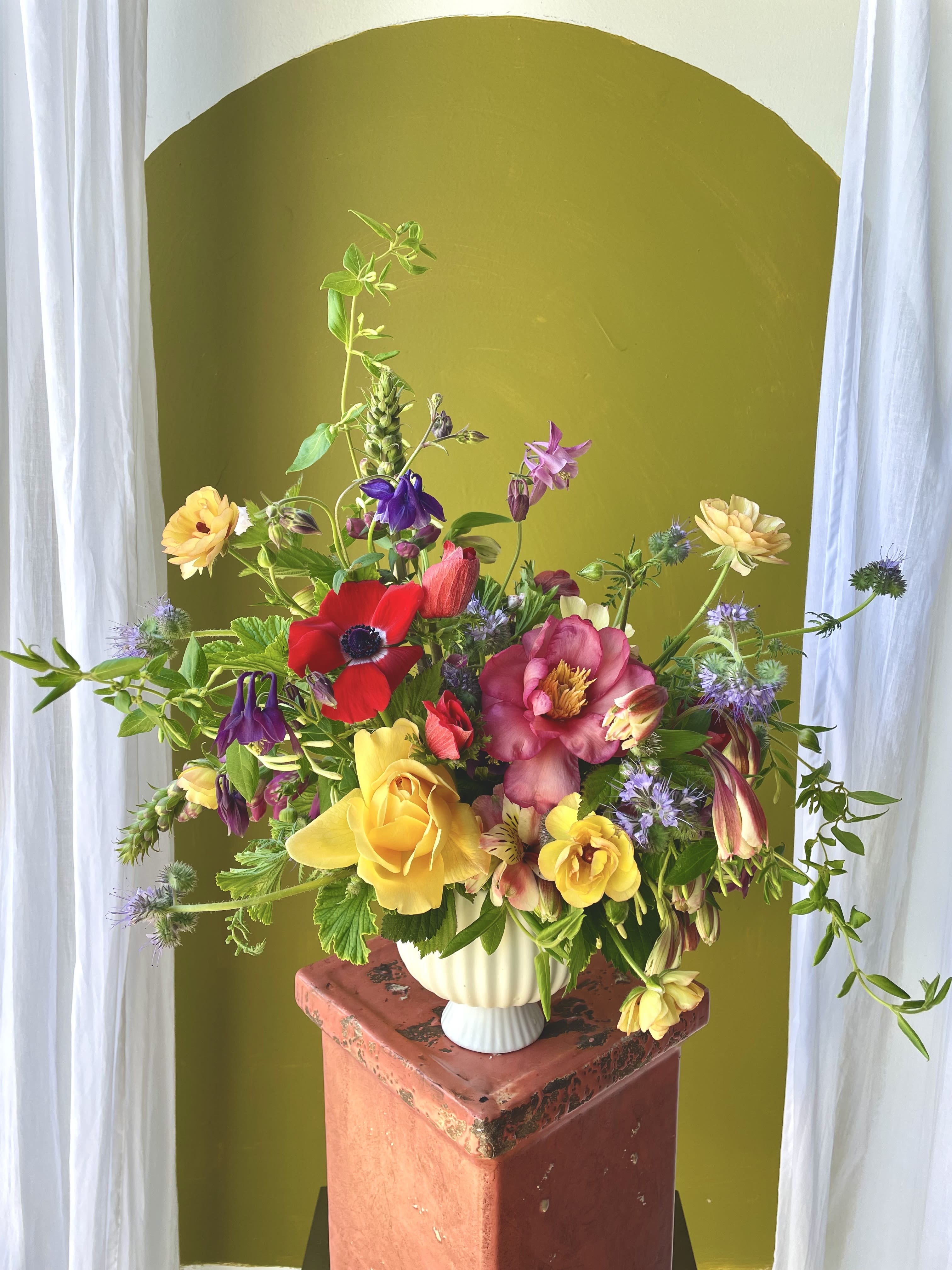 Colorful Designer's Choice - If you’re familiar with what we do and want us to create something distinctive and special for you, this is the perfect choice! Pictured is not representational of color or flowers included. However, you can expect the "Colorful" designer's choice to feature saturated and contrasting colors for a vivid and dynamic design.  *Standard size pictured*  Concerning Seasonality: As a seasonal, locally-focused florist, we have different product to work with each week. Our focus is on creating a unique piece for each customer, with blooms that are fresh from local farms and growers. While the flower varieties and colors may vary, the quality and freshness will always be the best. It is an honor to have our customers' trust and confidence in our abilities and artistic eye.   Delivery Policy: Pick-ups at the studio are available after 2pm. Our daily delivery time frame is typically between 12- 3 PM. Please specify if you require a certain delivery time and we will do our best to accommodate it, or we will call you if we cannot. Please include any gate codes if applicable! If there is no answer at the door, our delivery person will leave the flowers by the doorstep in a weather safe location or contact you to reschedule the delivery.  Completing your order acknowledges that you have read and understand our delivery policies. 