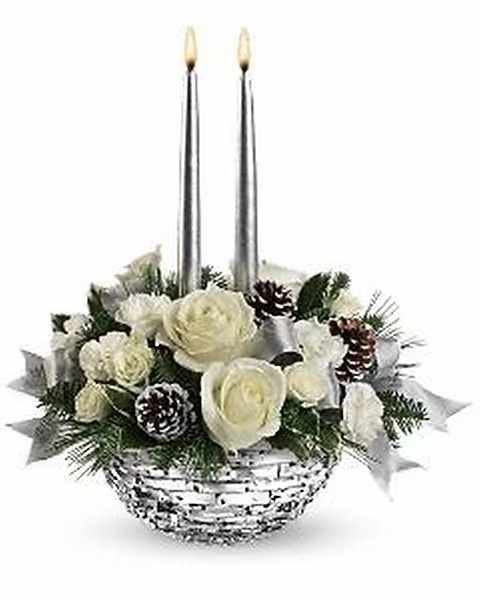 Splendid New Year Centerpiece - Sparkle in white! This festive centerpiece boasts white roses presented in our festive hand-polished glass bowl. White roses, white spray roses and white miniature carnations are accented by tips of white pine, holly and noble fir and frosted pinecones. Delivered in Teleflora's Sparkle of Christmas glass bowl.