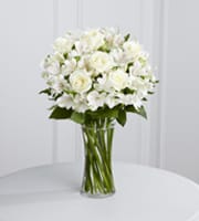 CHERISHED ONE BOUQUET - ASSORTED WHITE FLOWERS ARE BEAUTIFULLY ARRANGED IN A CLEAR GLASS VASE.